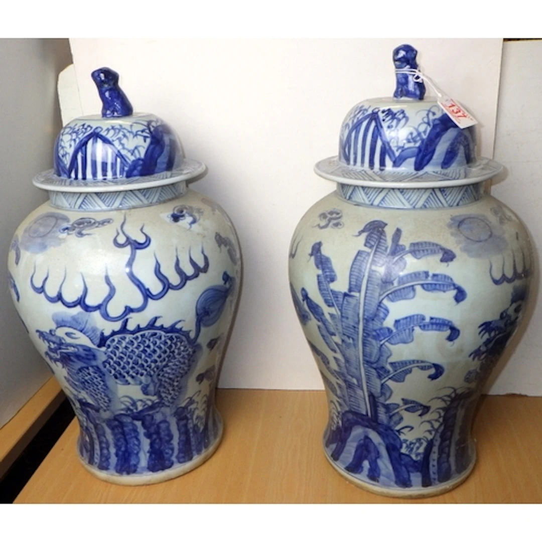 A large pair of Oriental lidded vases, 52cm tall