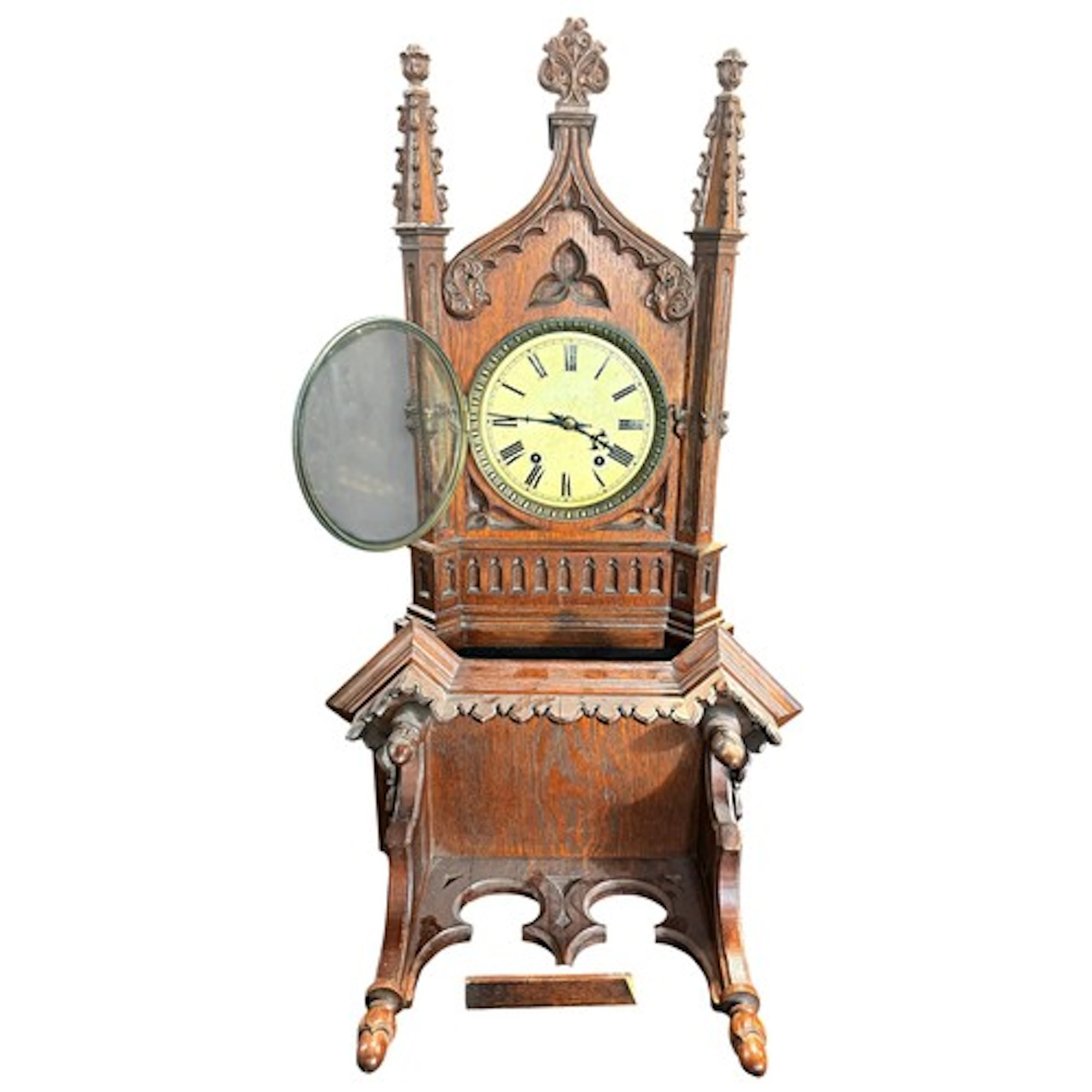A mid 19th century gothic revival oak cased bracket clock an...