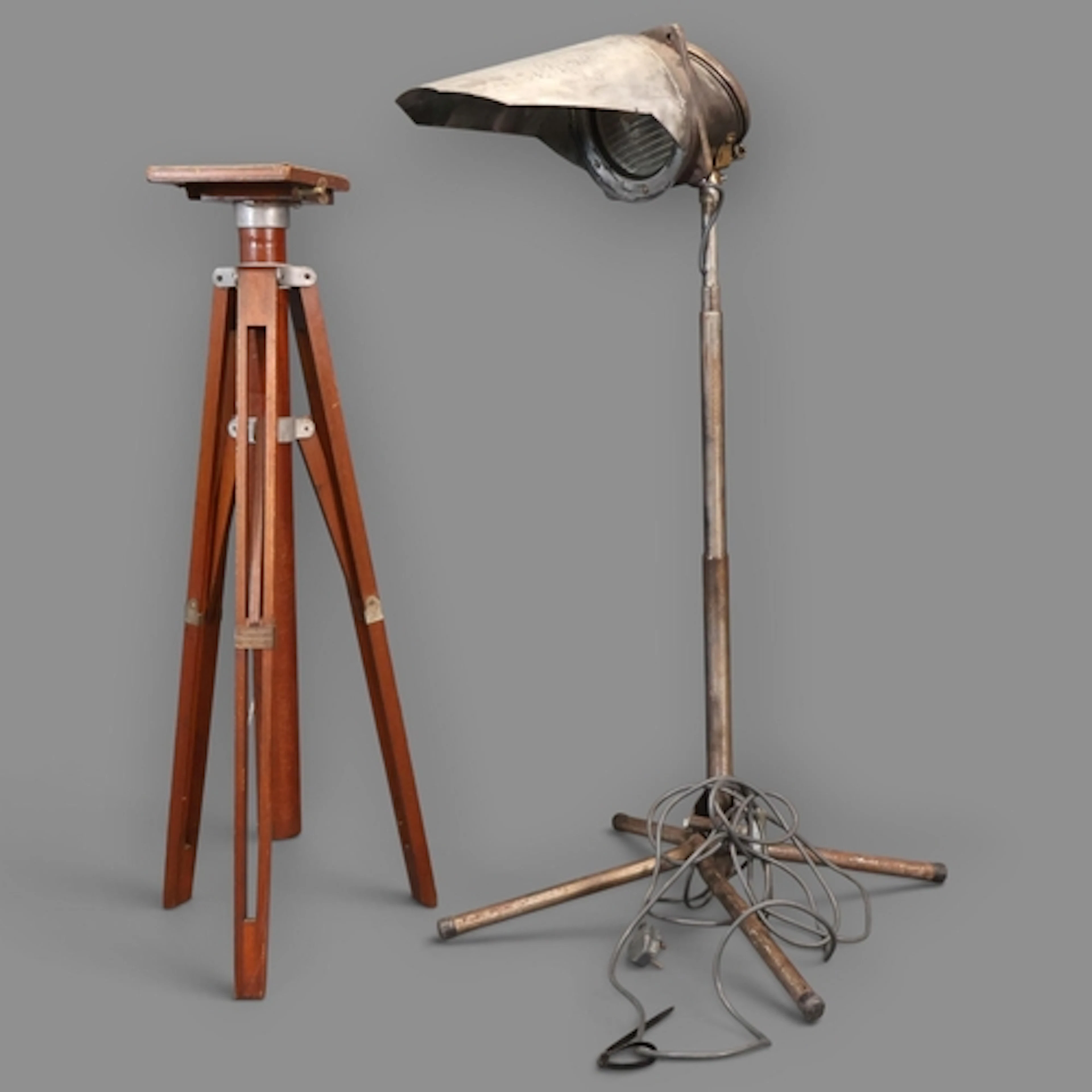 A vintage French floor standing rail lamp with angled shade,...