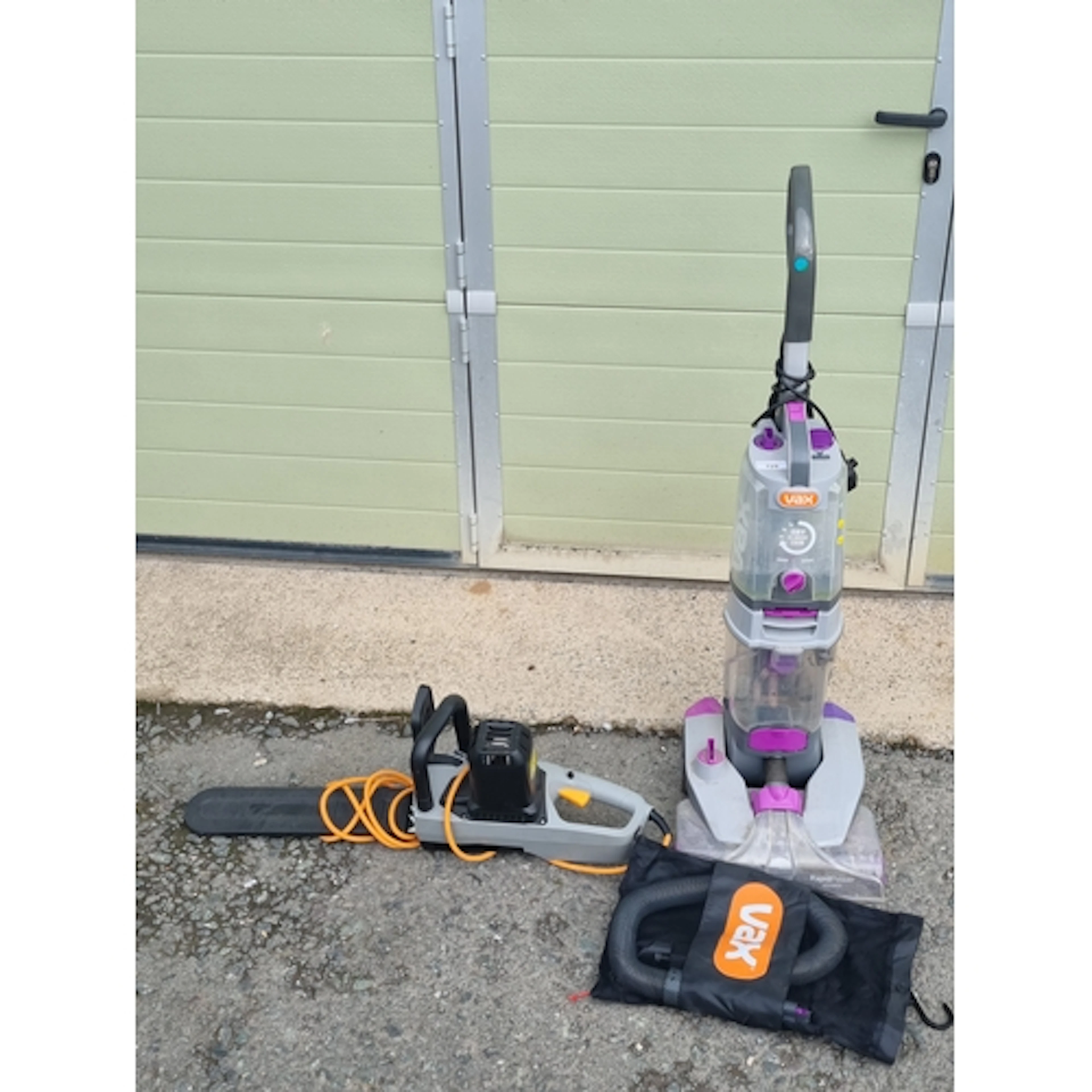 A Vax Carpet Cleaner and an electric Chainsaw (R8)