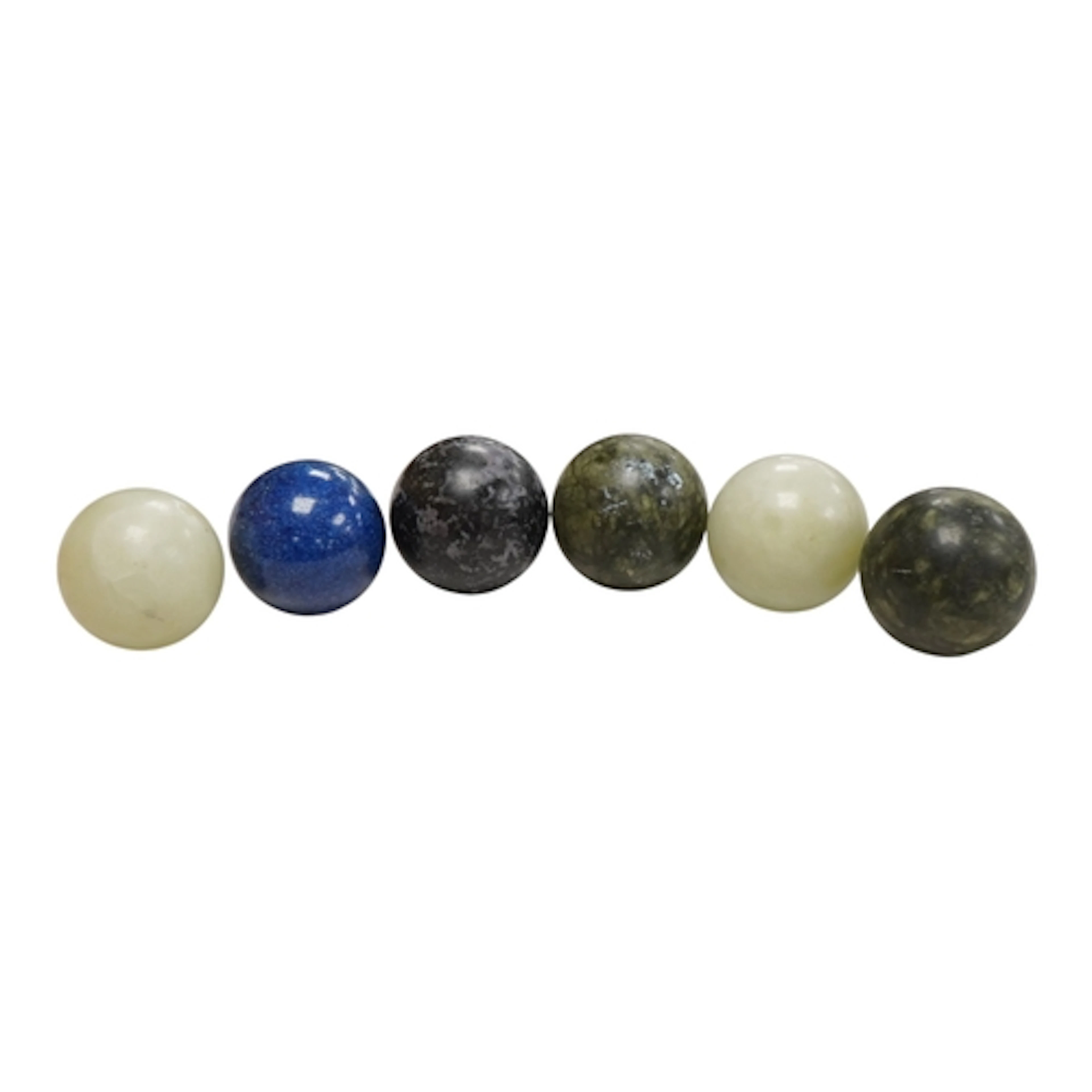 Six hardstone carved spheres, 5cm in diameter