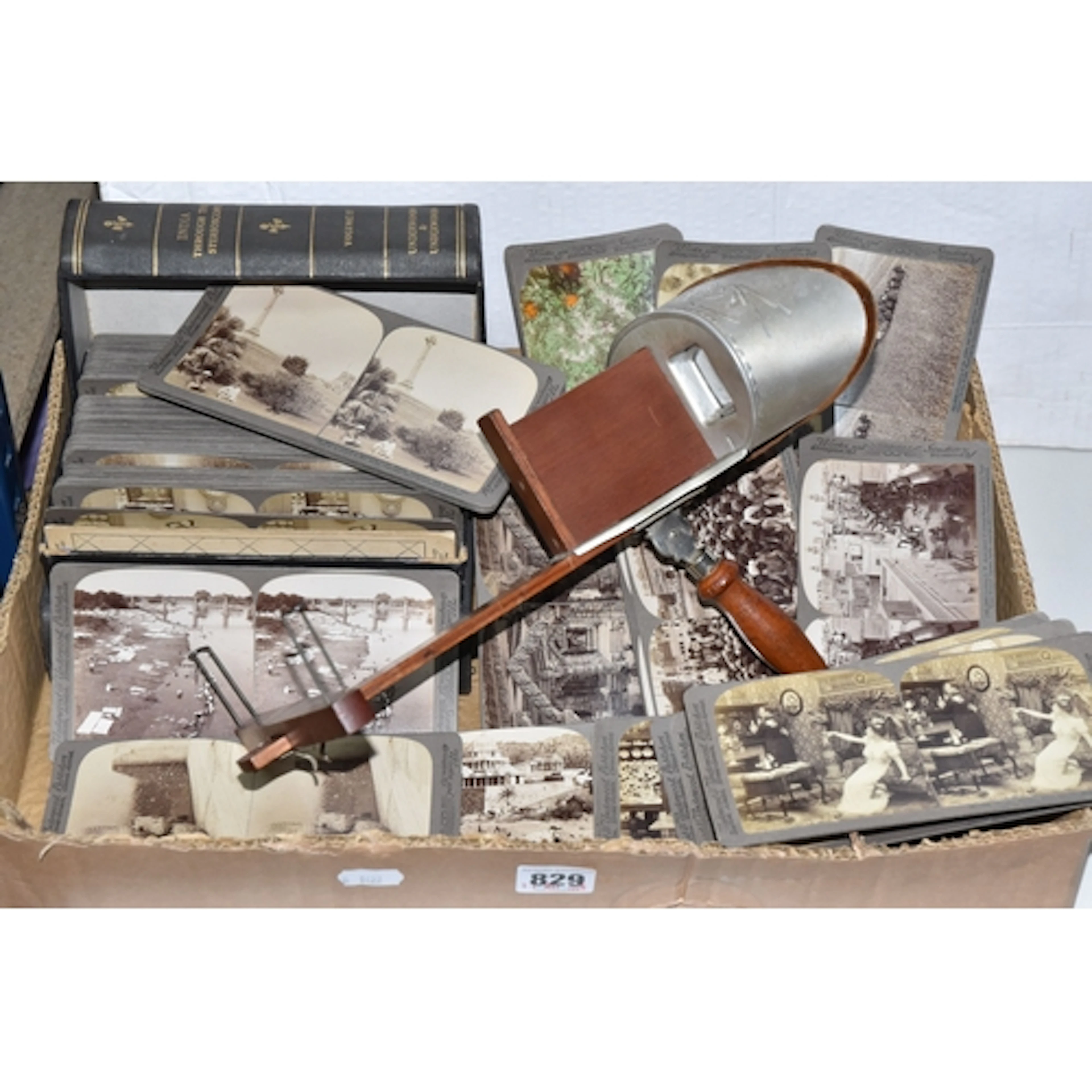 A STEREOSCOPE AND A SELECTION OF CARDS comprising an Underwo...