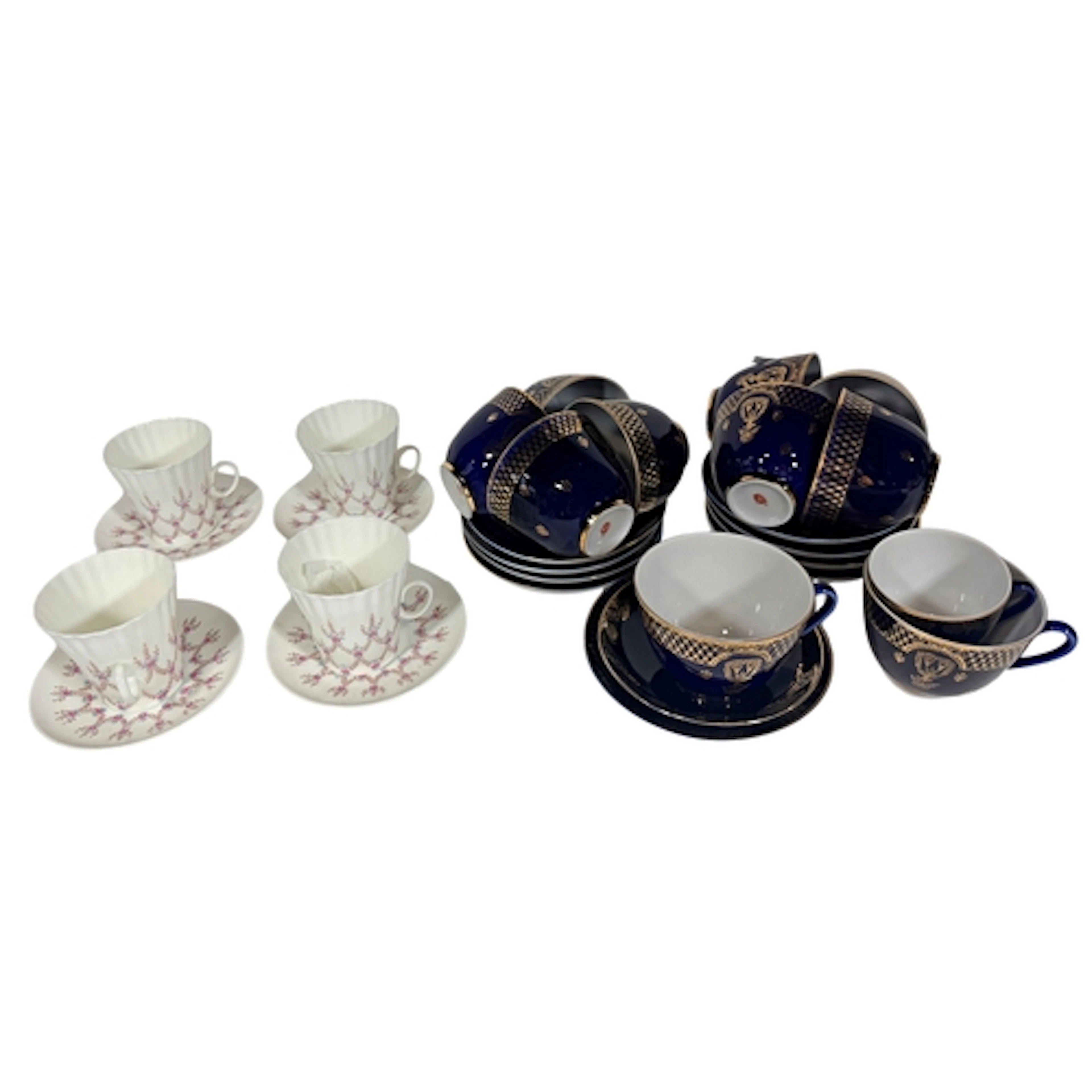 A collection of Continental porcelain tea cups and saucers i...