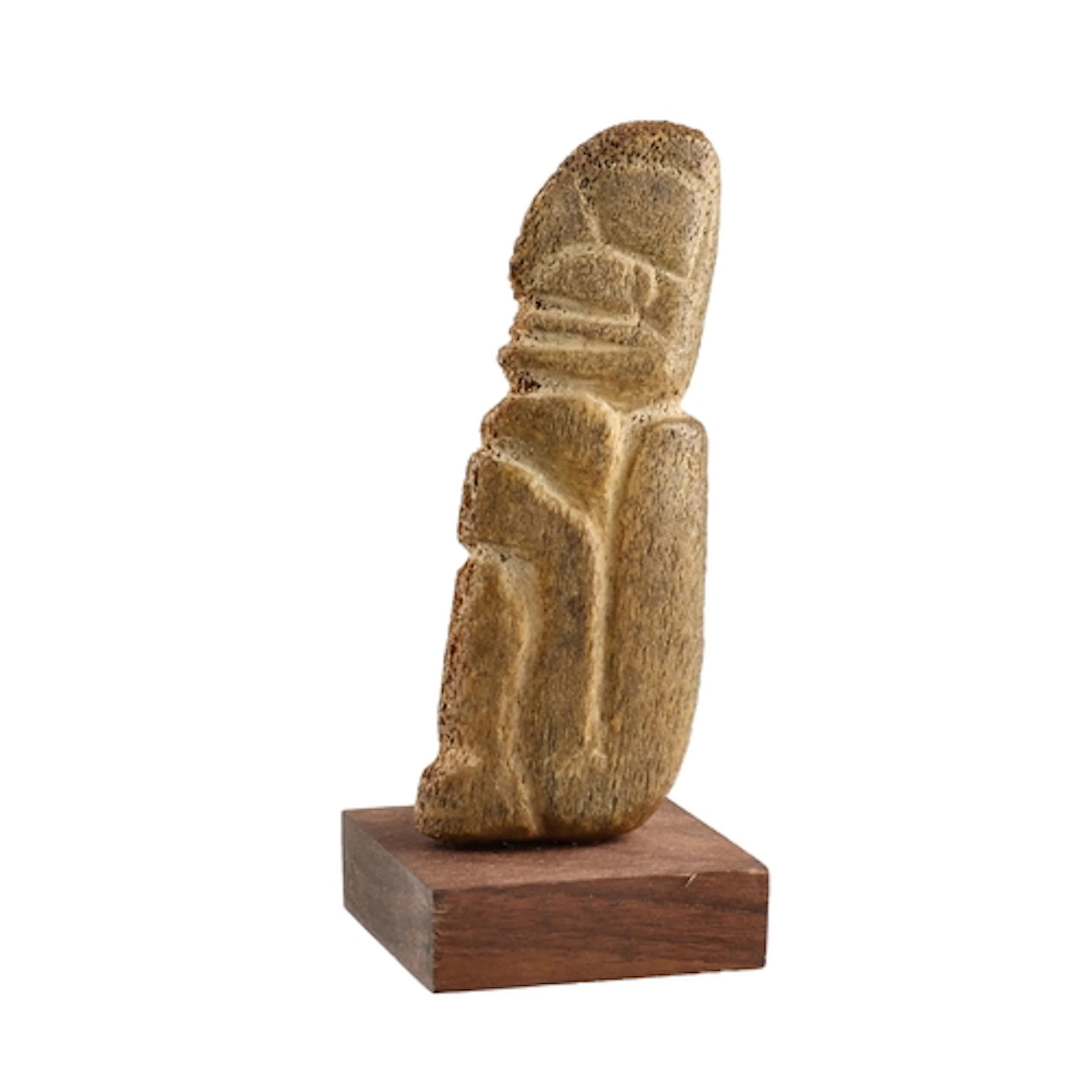 A PRE-COLUMBIAN MEZCALA BONE FIGURE Mounted on a wooden base...