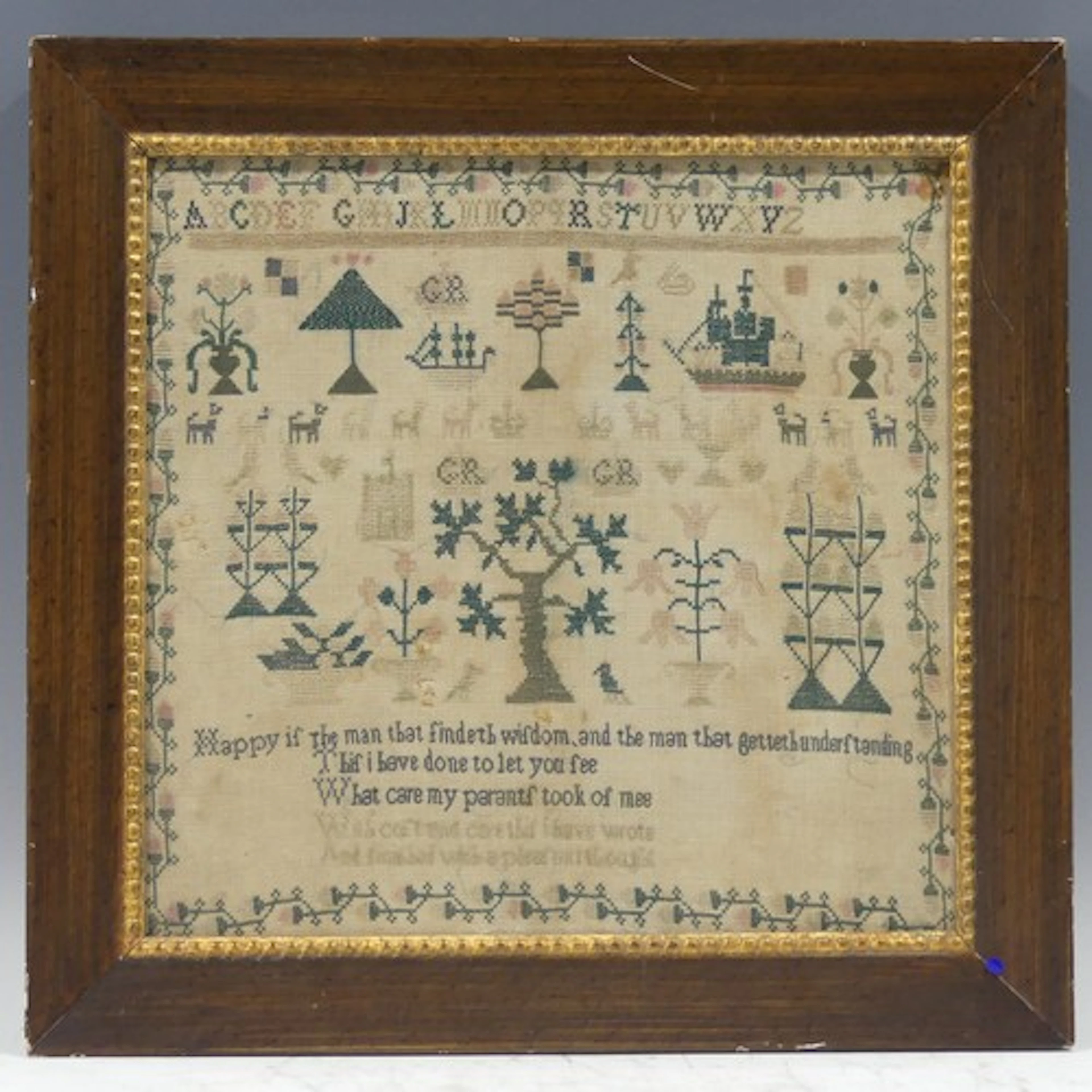 A Georgian needlework Sampler, worked in coloured threads on...