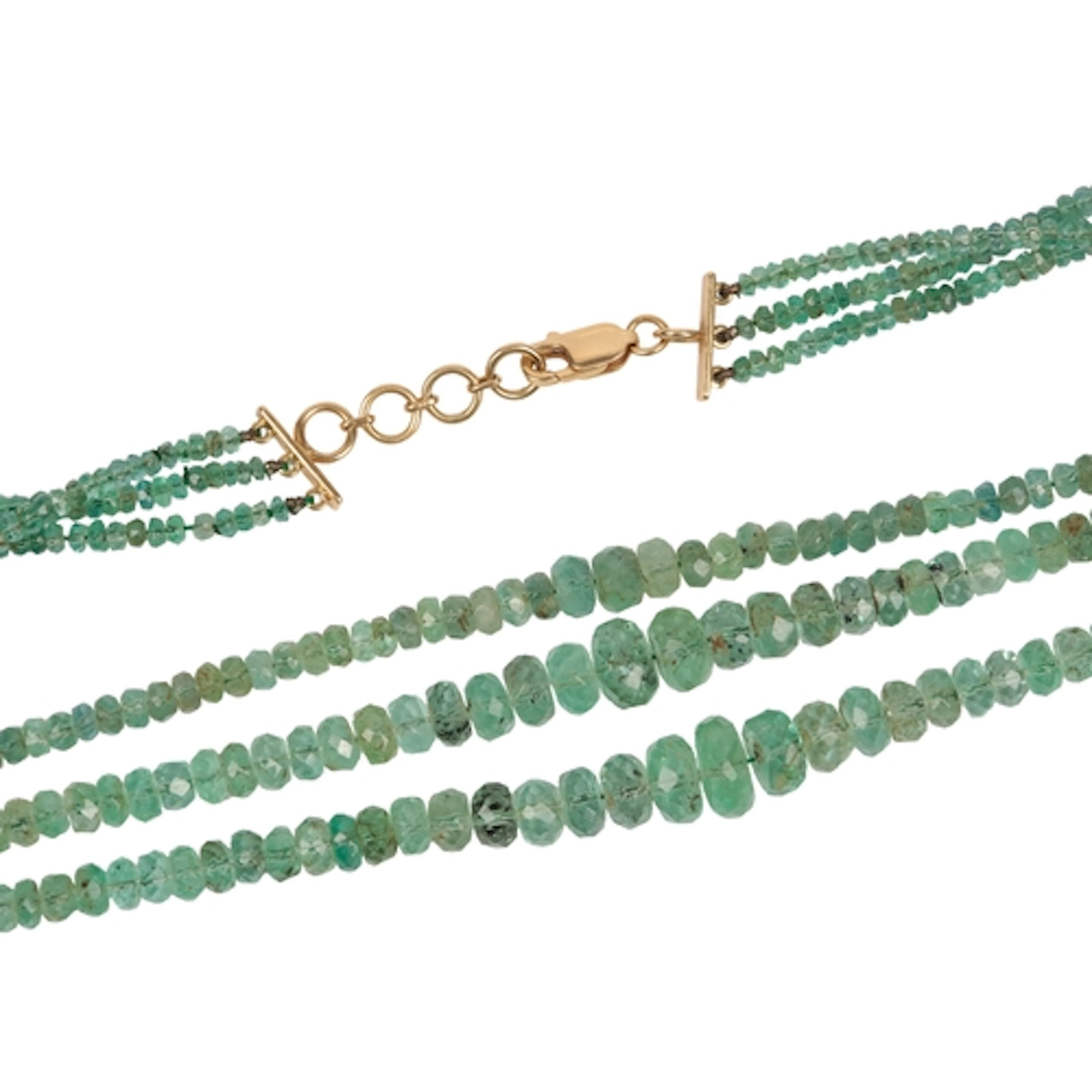 An emerald bead necklace, composed of three strands of gradu...
