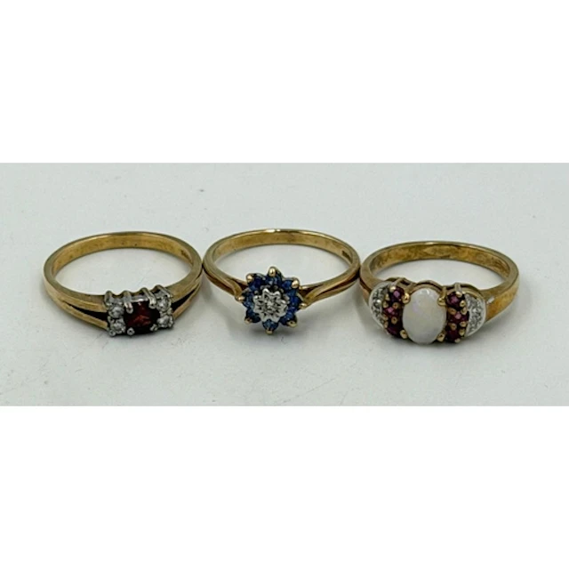 Three 9ct gold rings, varying styles, approximate weight 7.1...