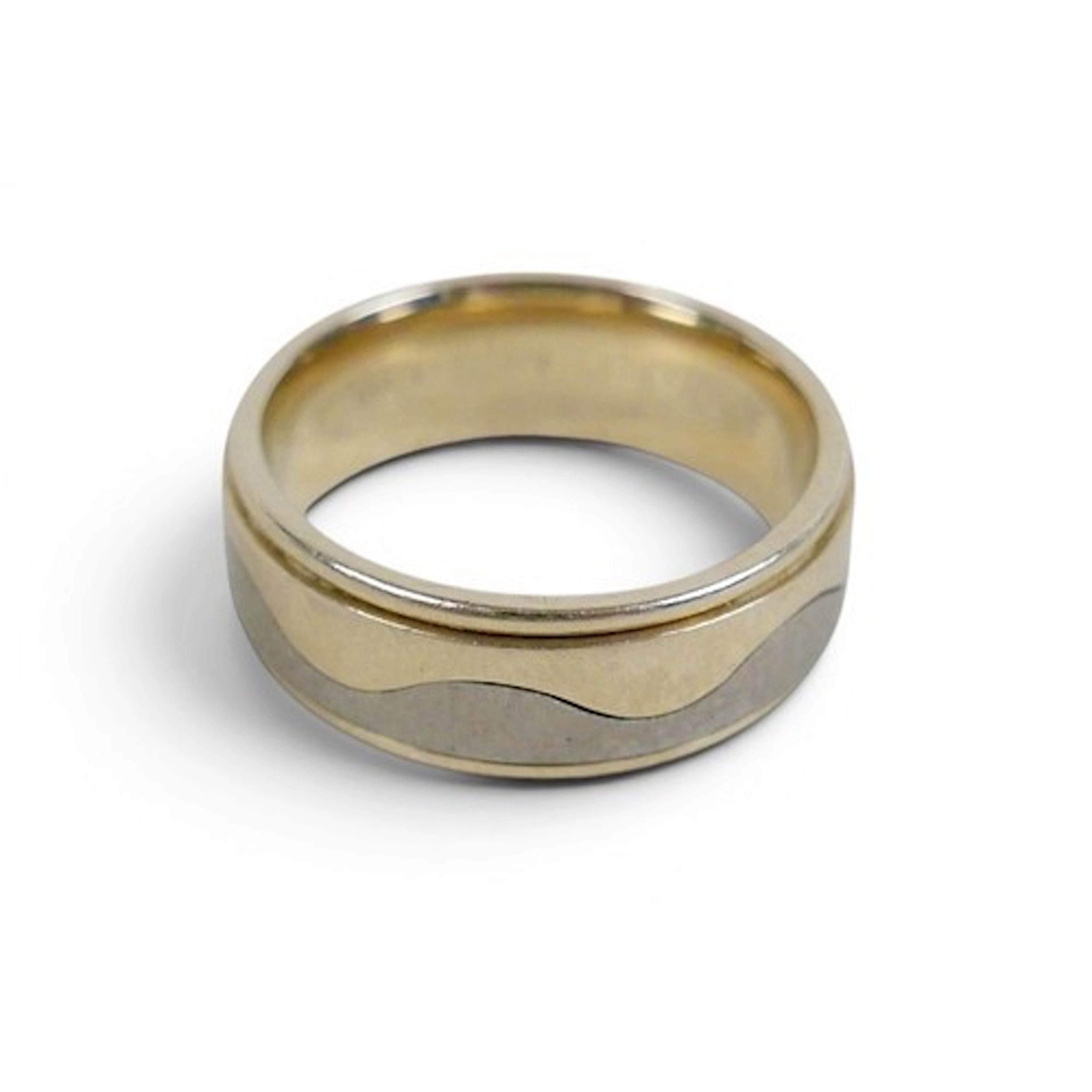An 18ct gold and titanium gents ring, bi-color wave design, ...