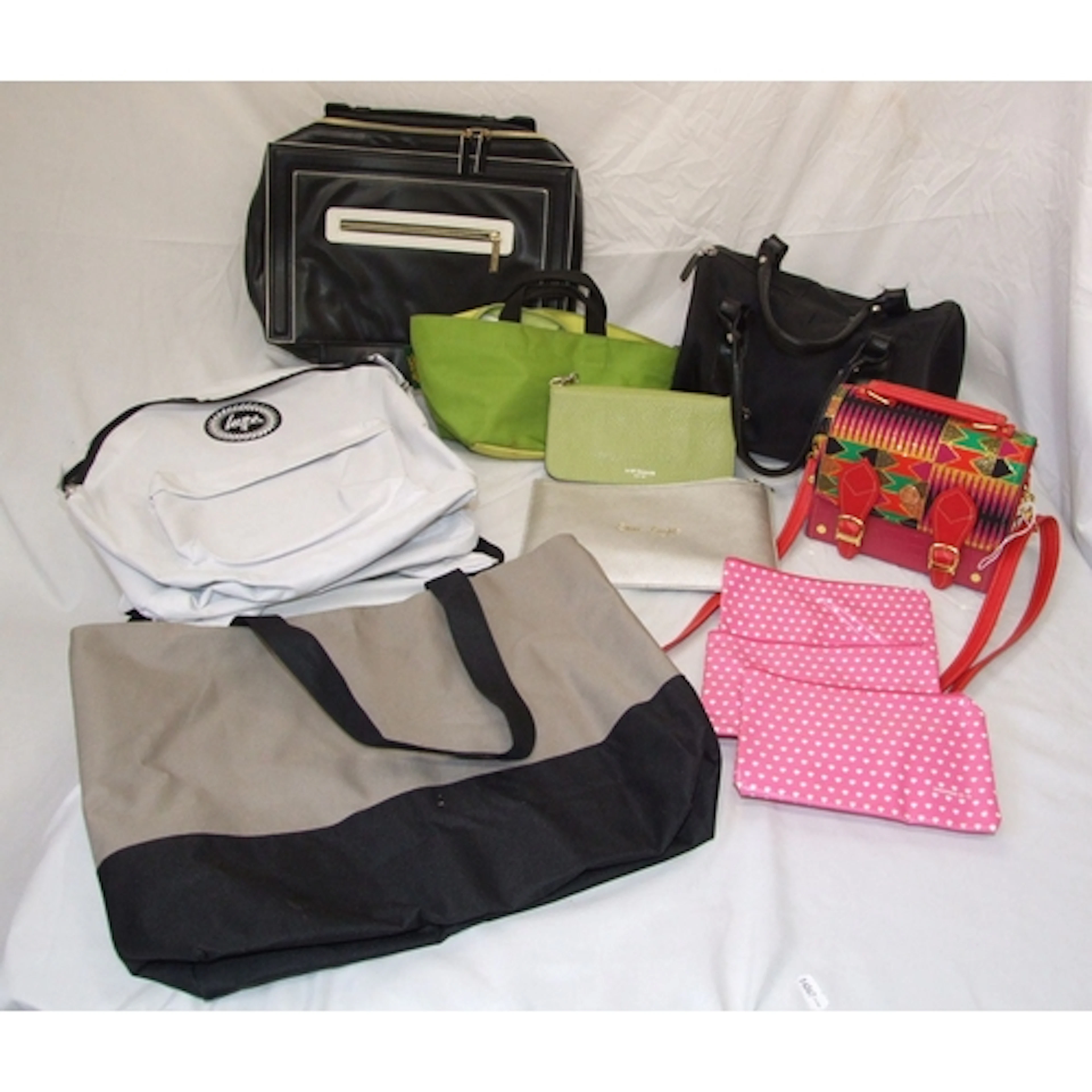 DKNY black circular tote bag, Estee Lauder bag, Hype rucksac...