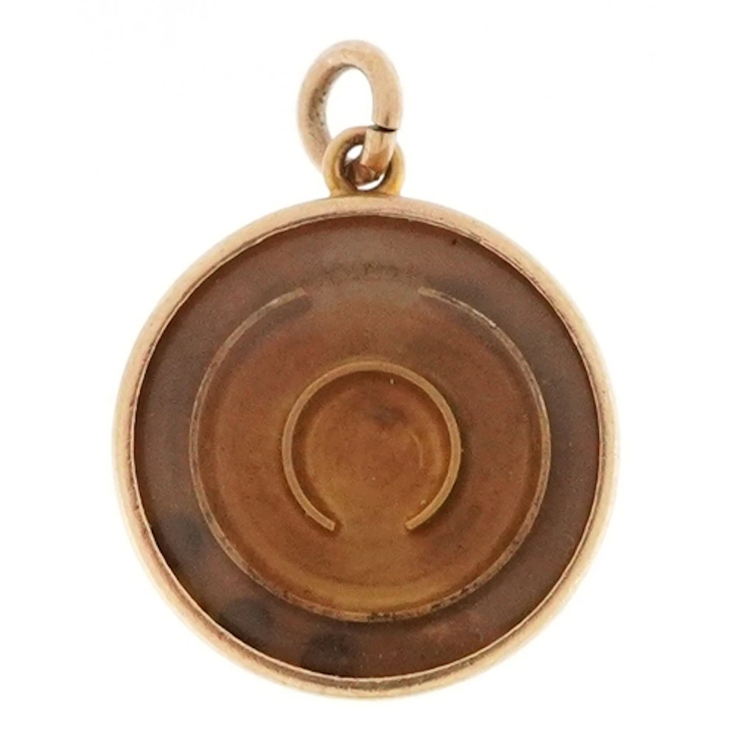 9ct gold charm in the form of a ball puzzle game, 1.4cm in d...