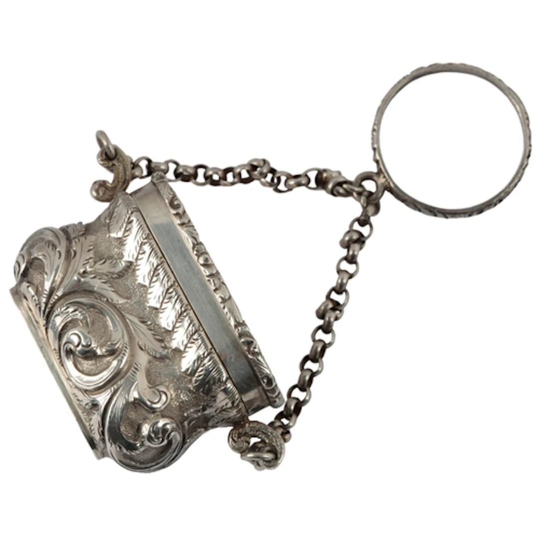 A William IV novelty silver vinaigrette, modelled as a handb...