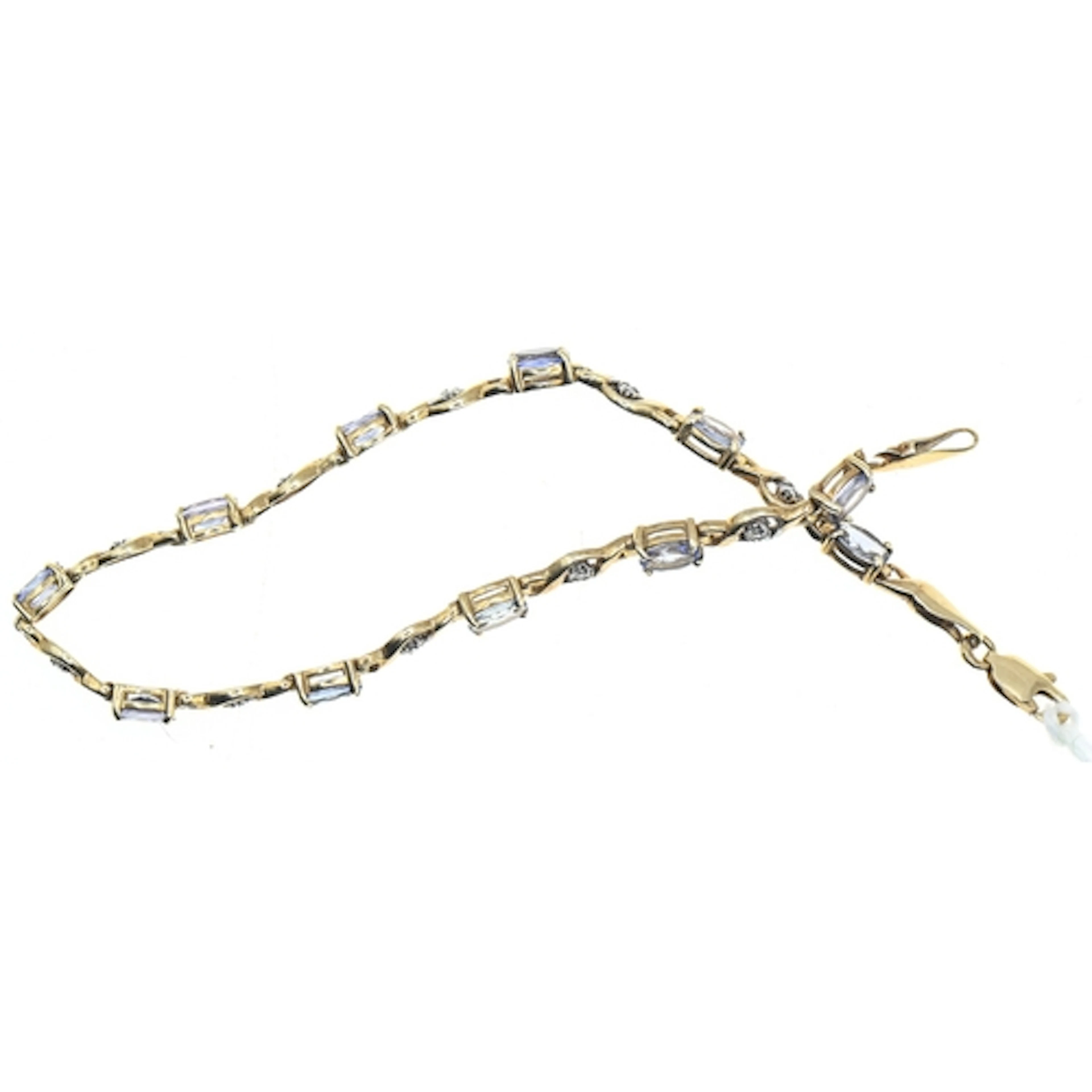Diamond and tanzanite bracelet, the yellow metal bracelet ma...