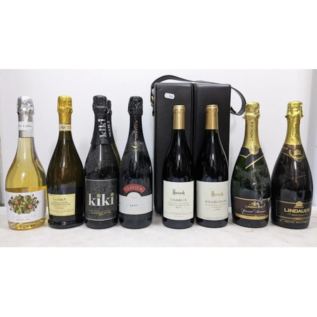 Ten bottles assorted wine and sparkling wine, including Harr...