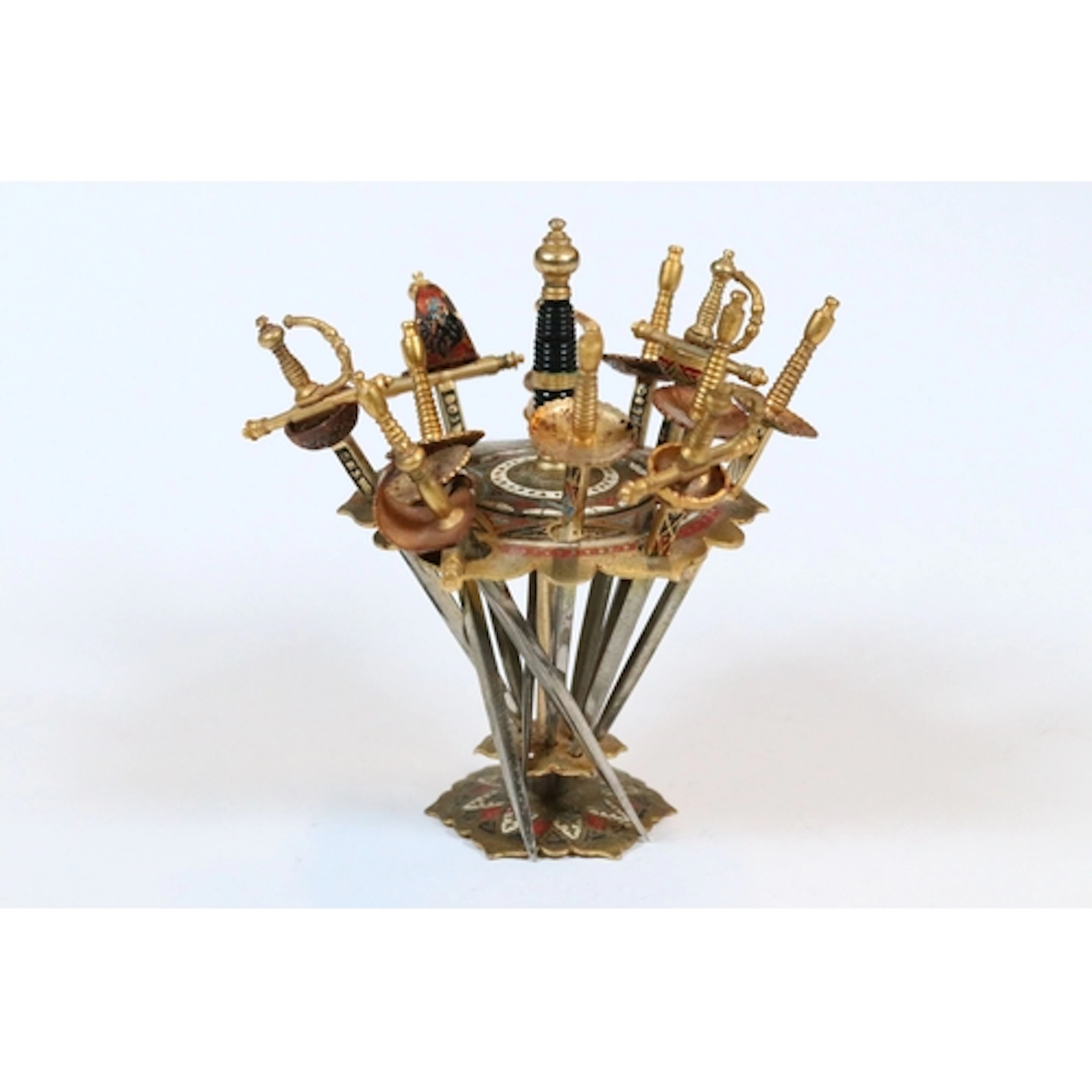 Mid-century Toledo cocktail pick stand having picks in the f...