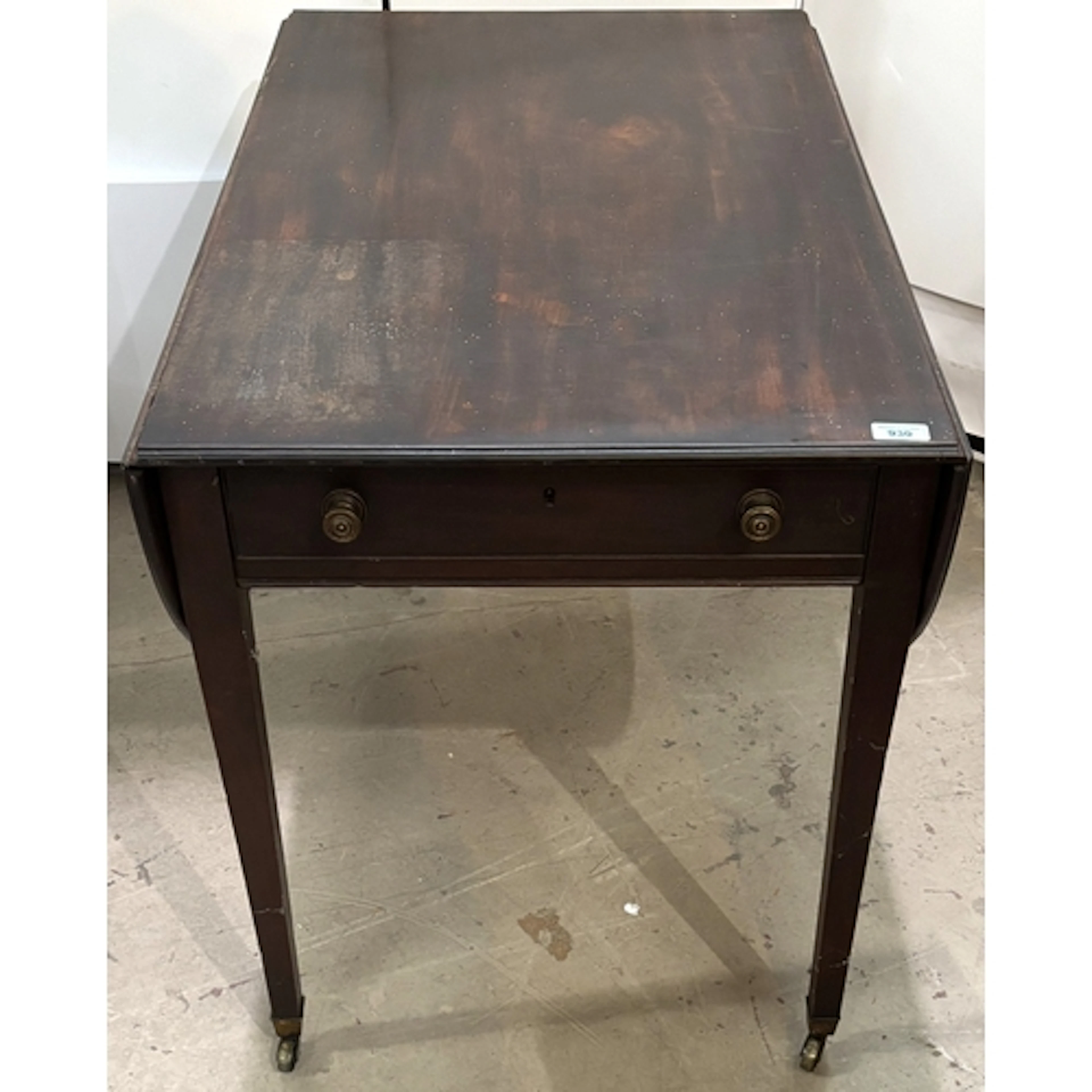 A George III mahogany 1 piece top double drawer Pembroke tab...