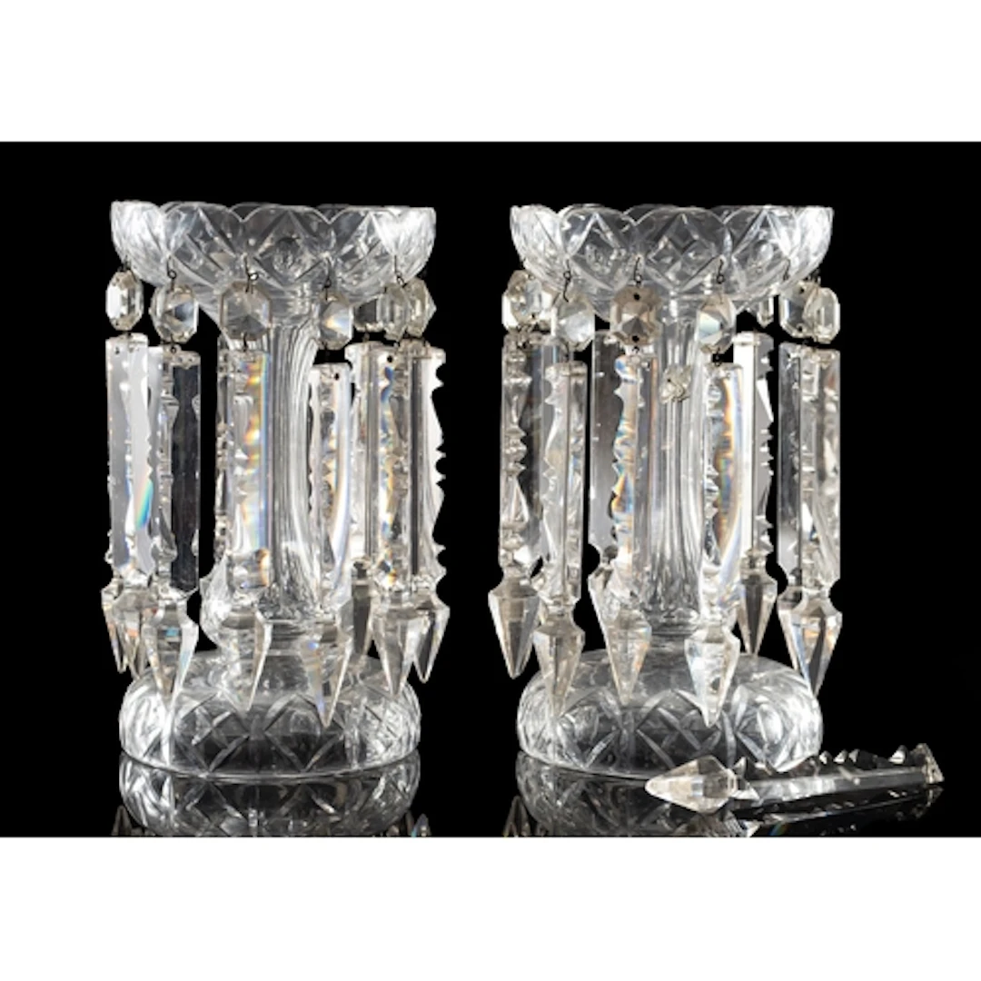 A pair of cut glass table lustres of typical form with bulbo...