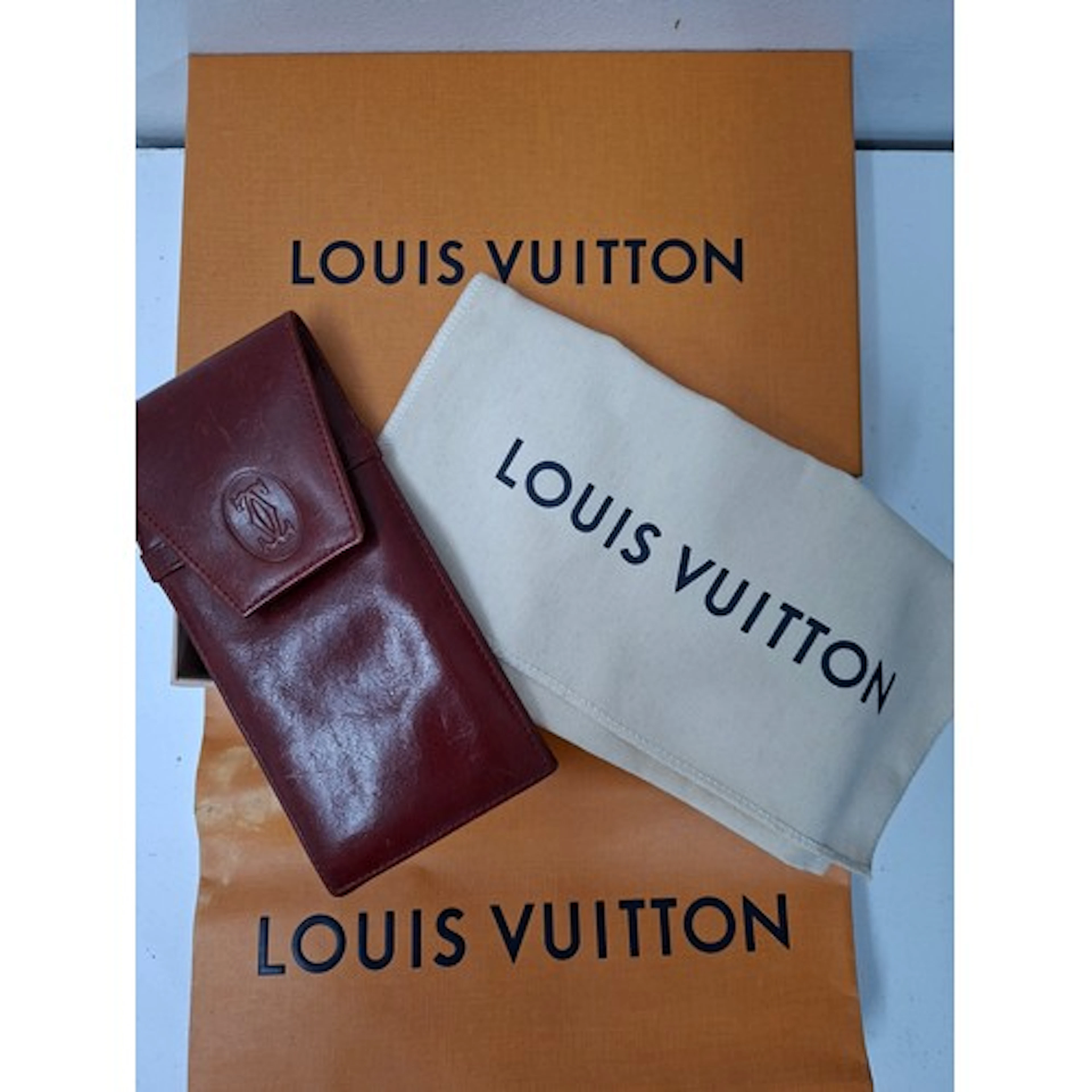 Cartier- A vintage oxblood leather prescription glasses case...