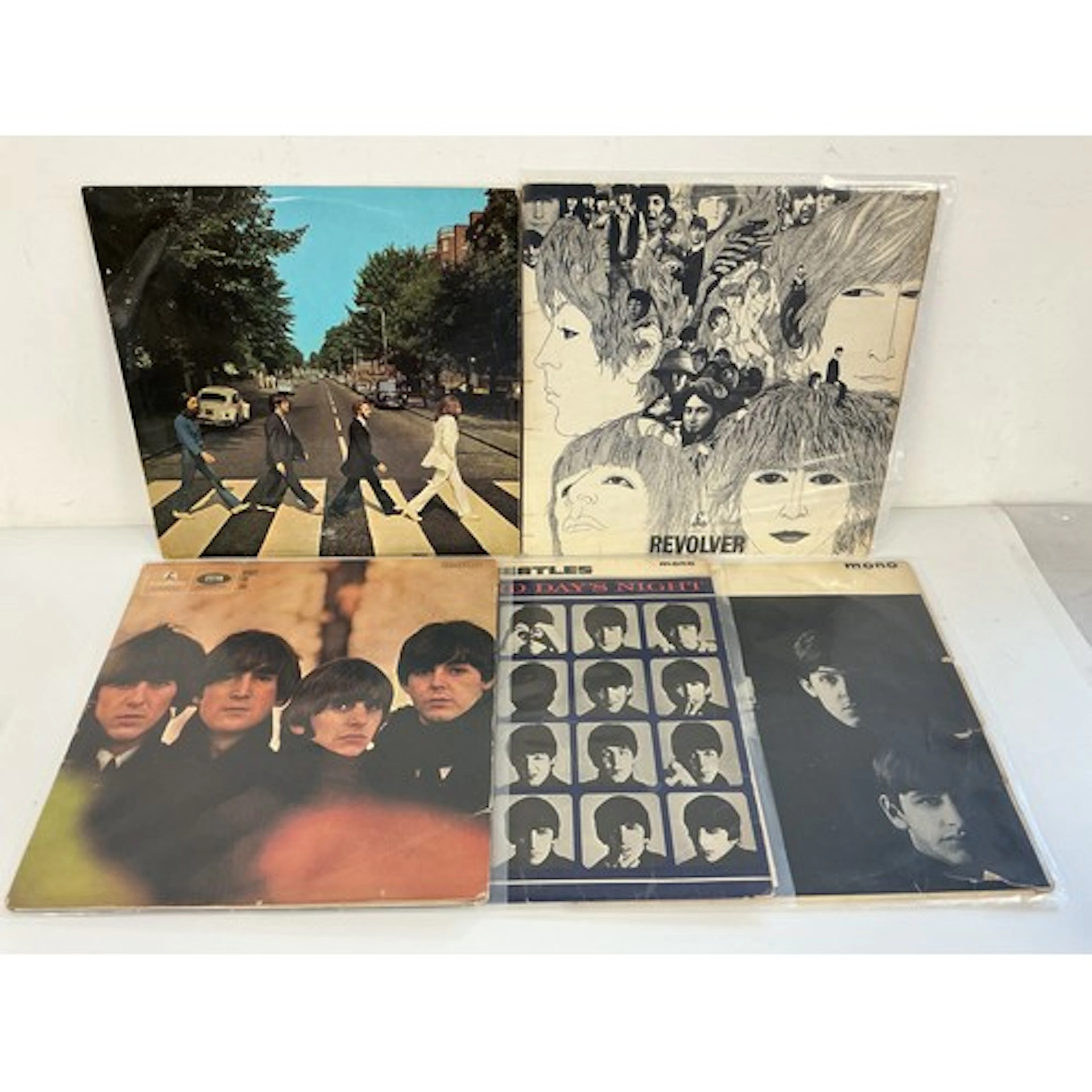 A collection of Beatles LPs, EPs and 7” singles comprising e...