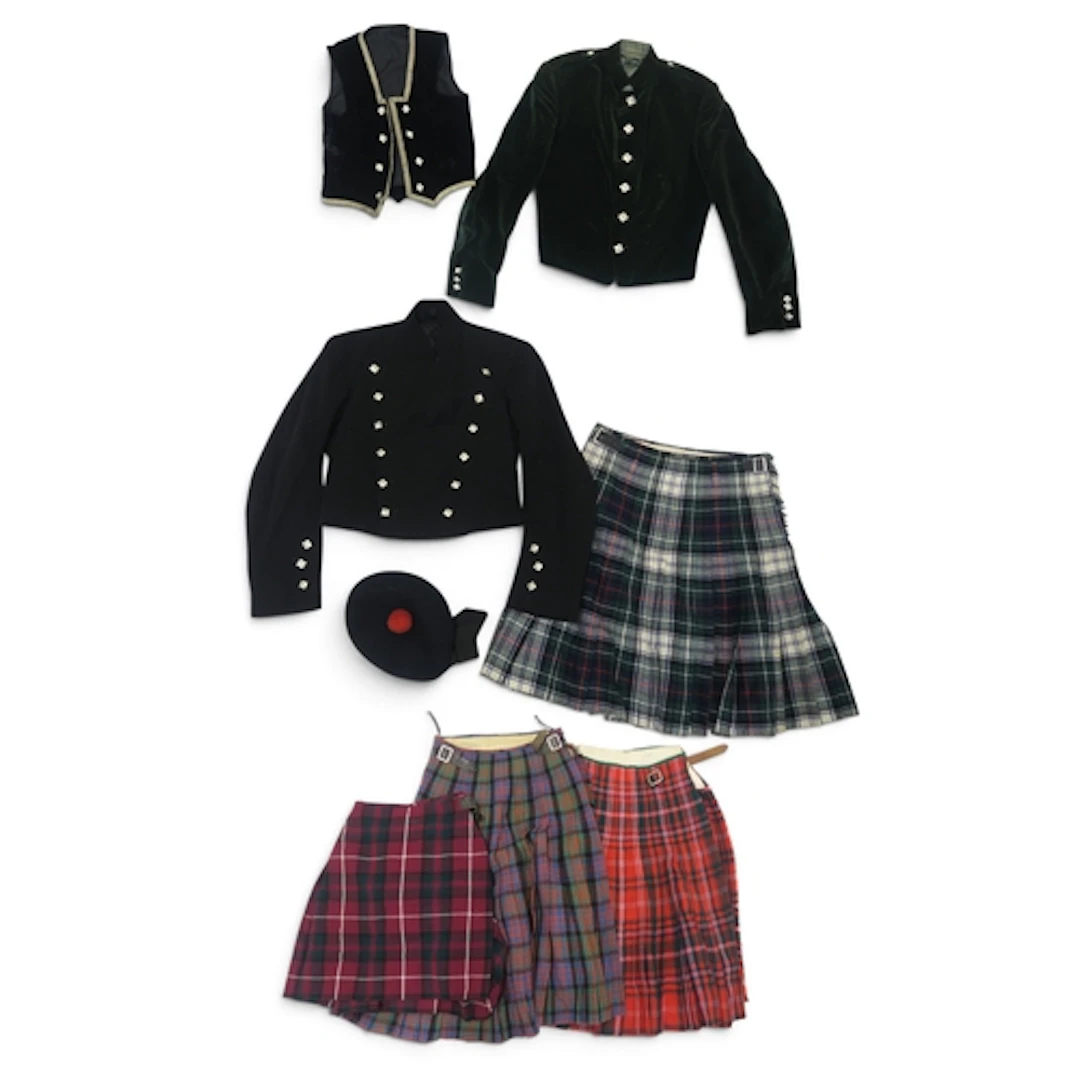 Highland wear comprising a dark green velvet Prince Charlie ...
