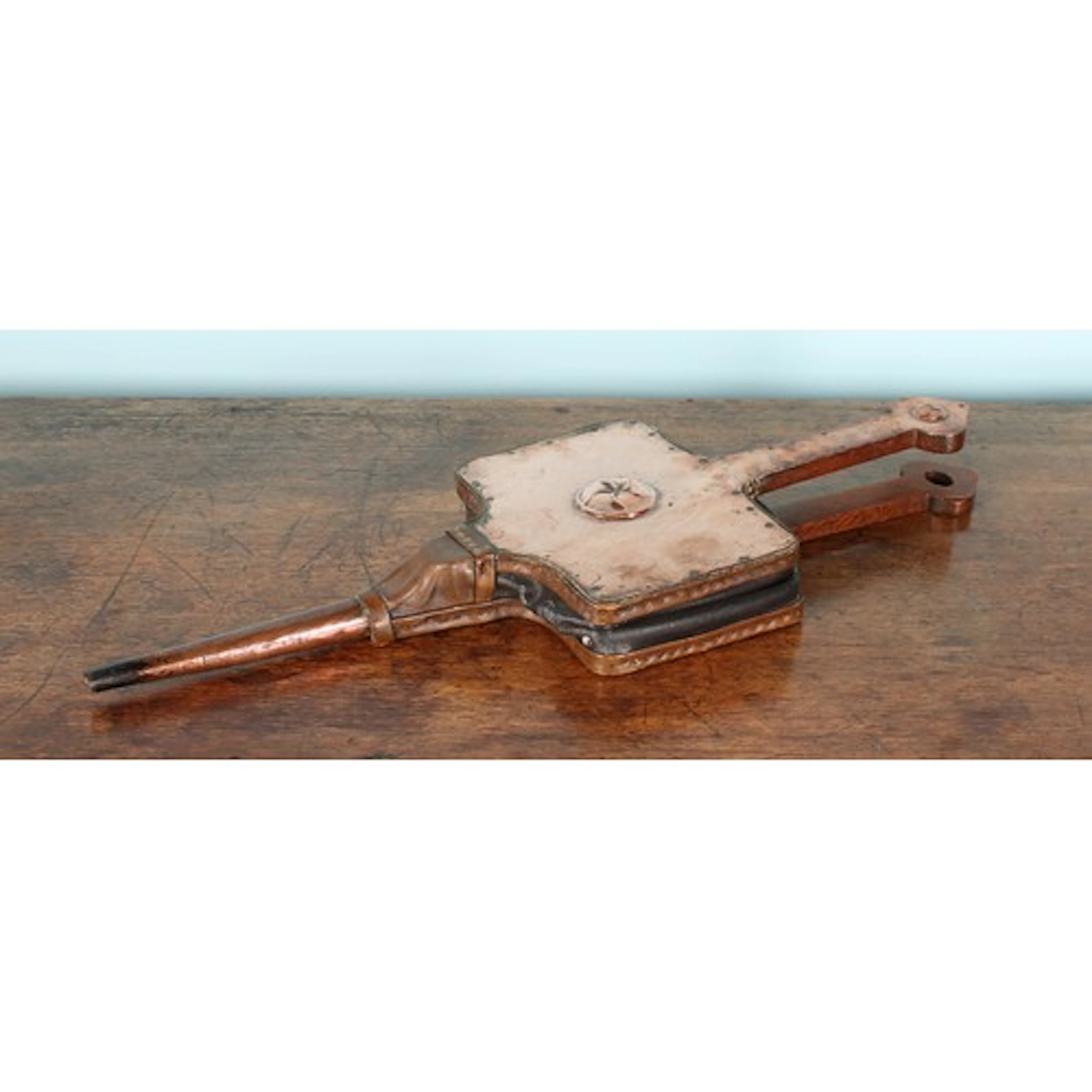 A pair of Arts & Crafts oak and copper fire bellows, 70cm lo...