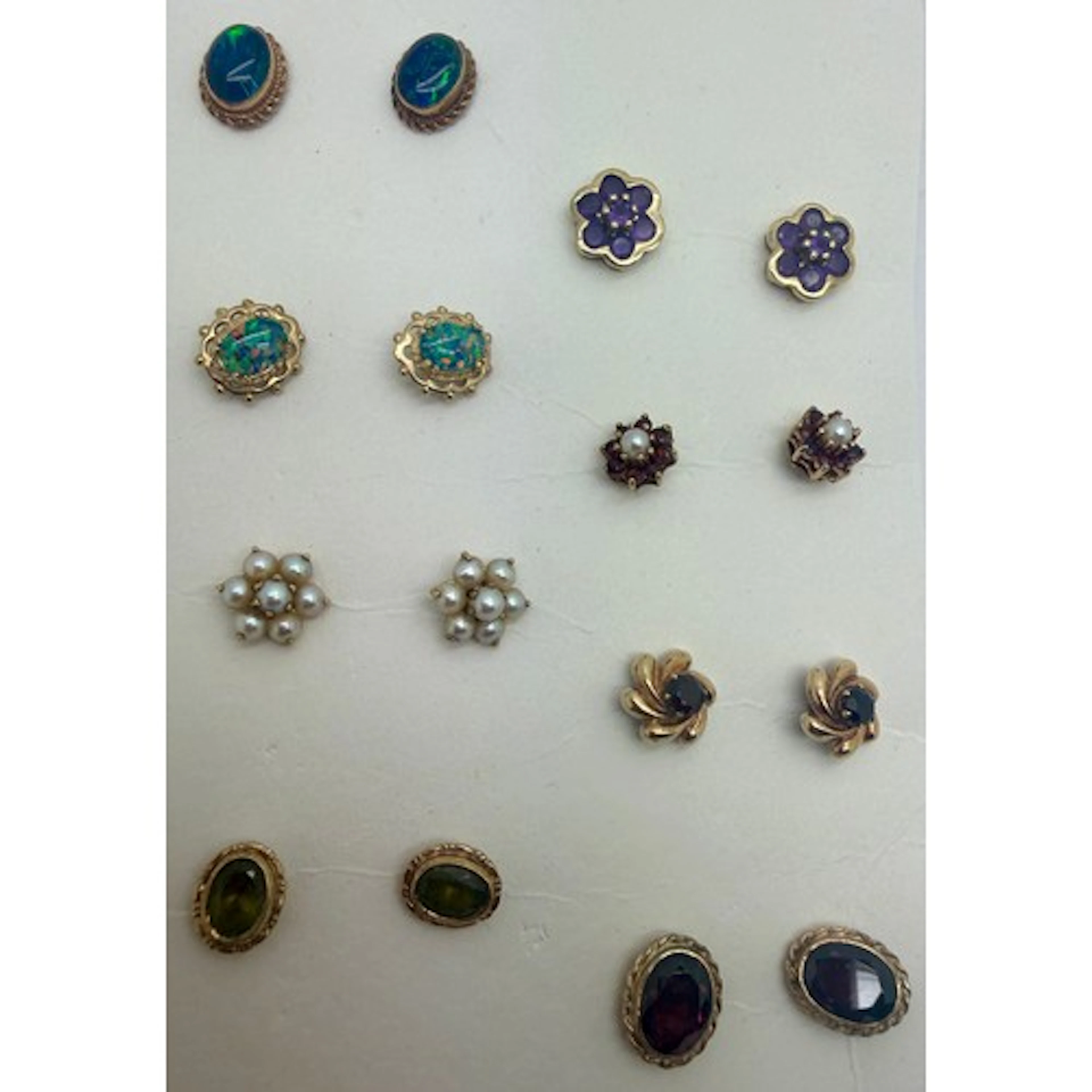 Eight pairs of gem set earrings to include 9 carat gold moun...