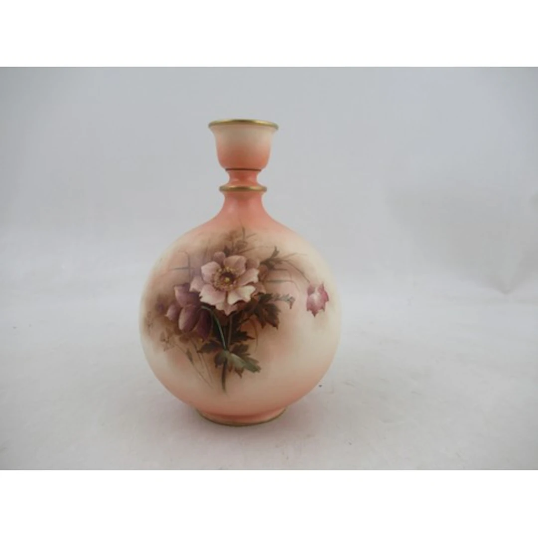 A Hadleys Worcester globular vase, decorated with sepia flow...