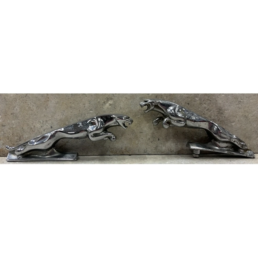 Two 5" Jaguar bonnet mascots. Est. £20 - £30.