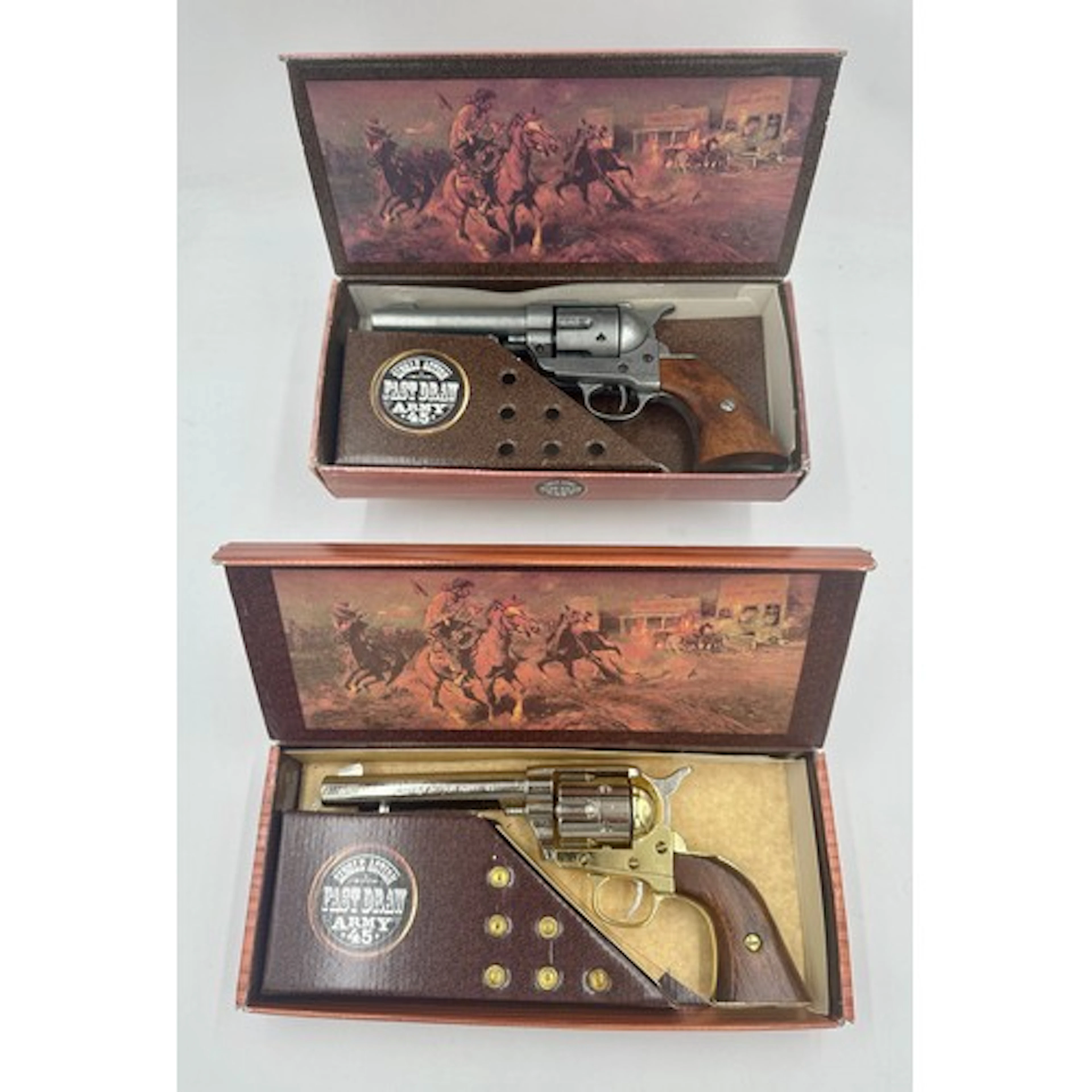 Two boxed replica Single Action Colt Army 45 revolver by Kol...