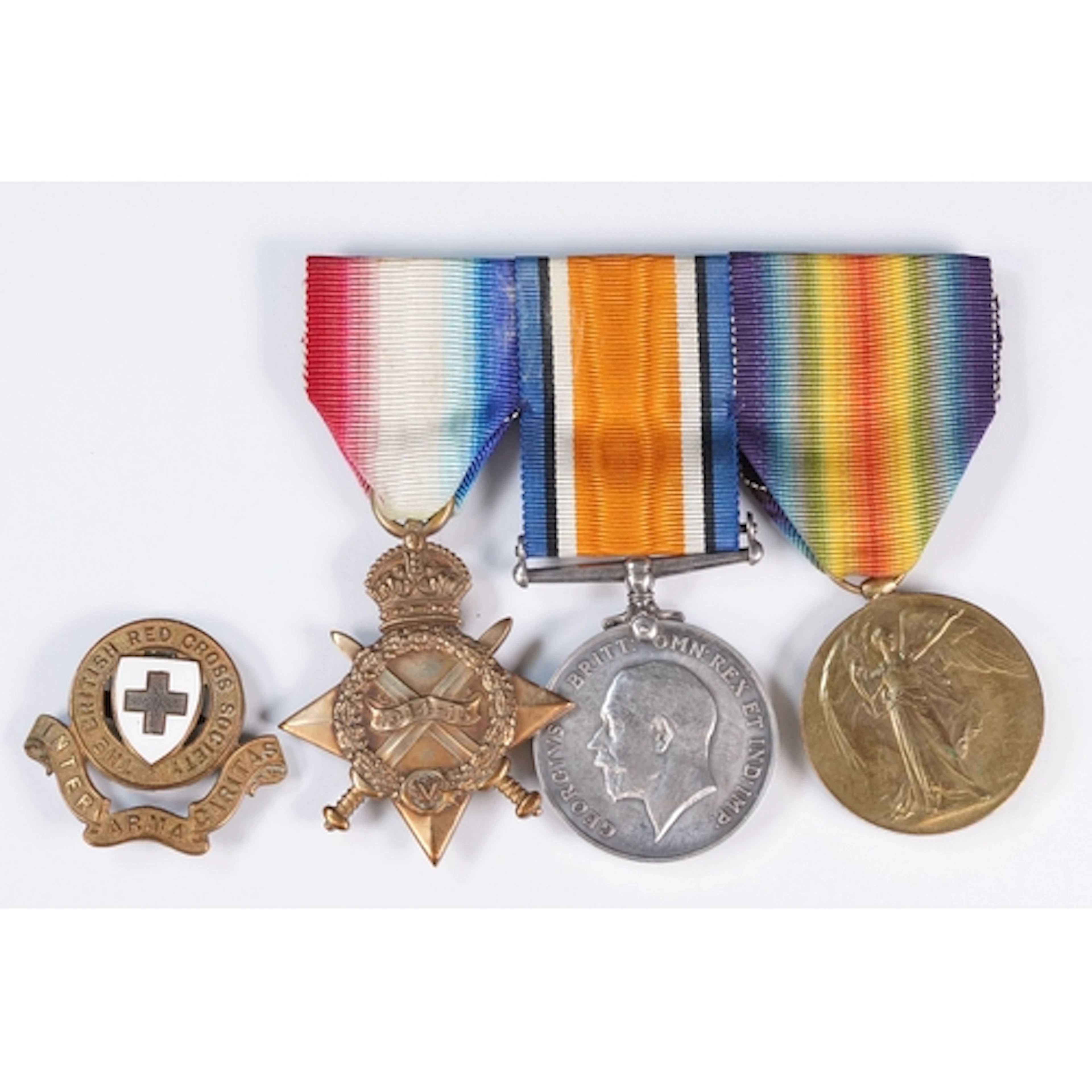 A British World War One full size medal trio to include the ...