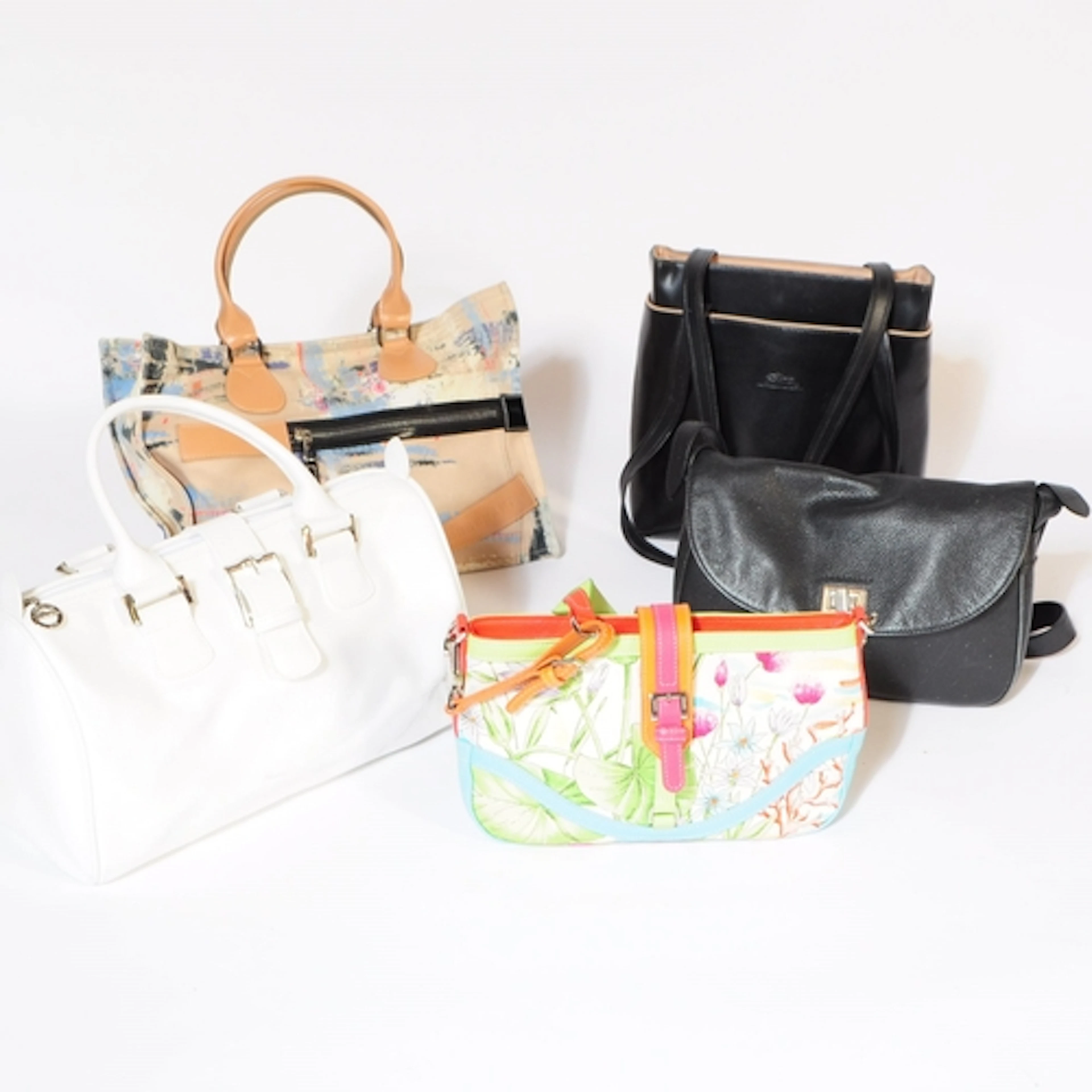 A collection of five Longchamp bags. The lot to include a mu...