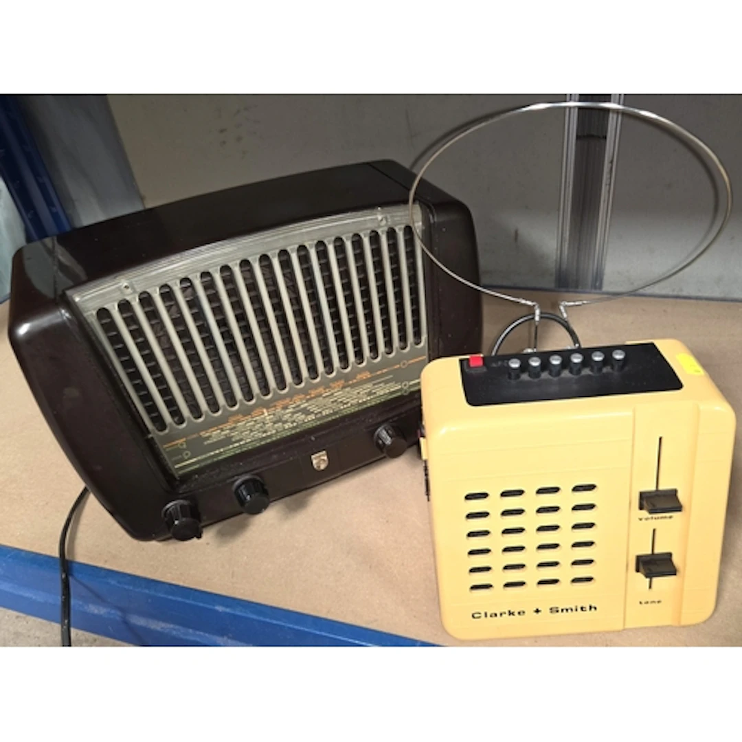 A Clarke and Smith TV receiver and a Philips 431A Radio.
