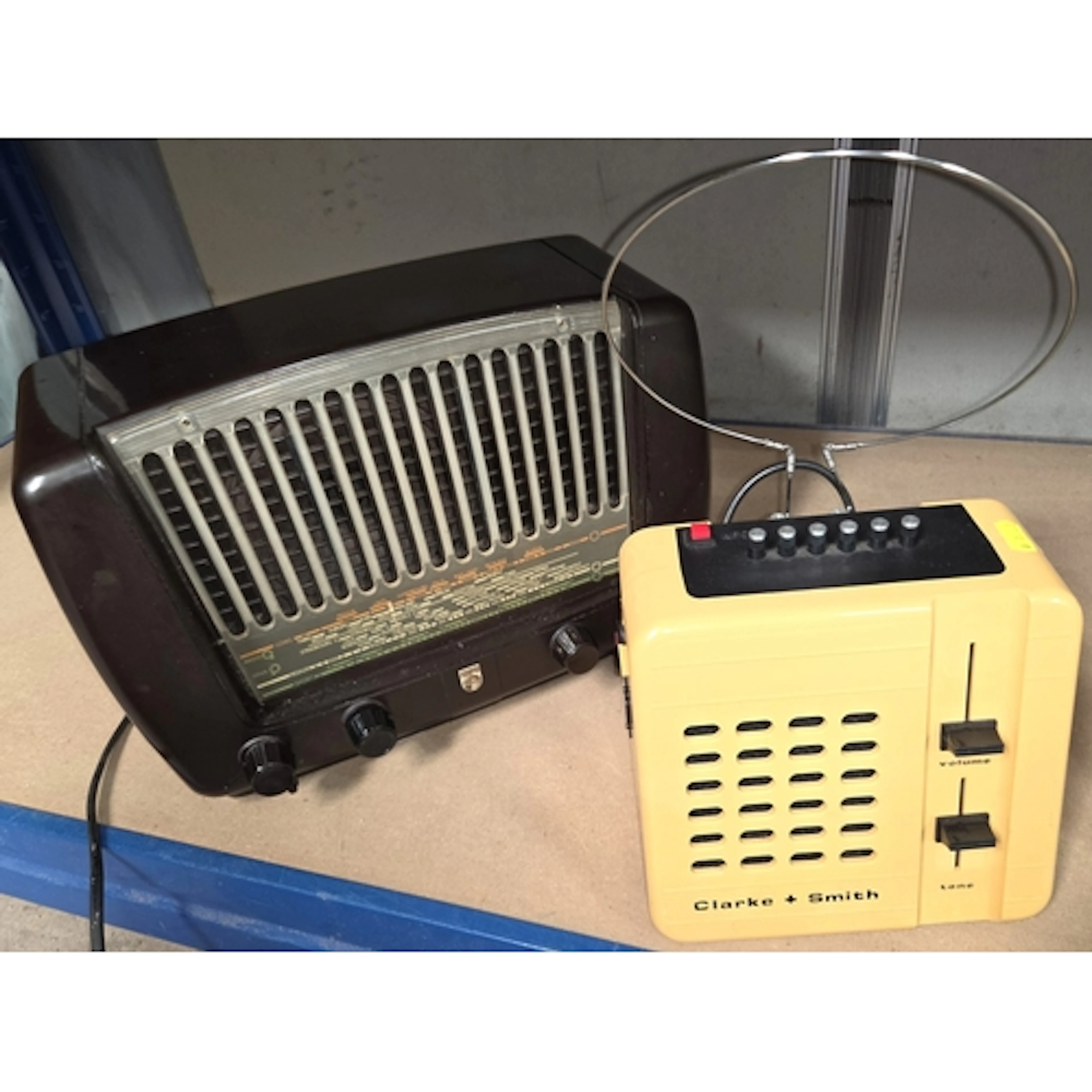 A Clarke and Smith TV receiver and a Philips 431A Radio.