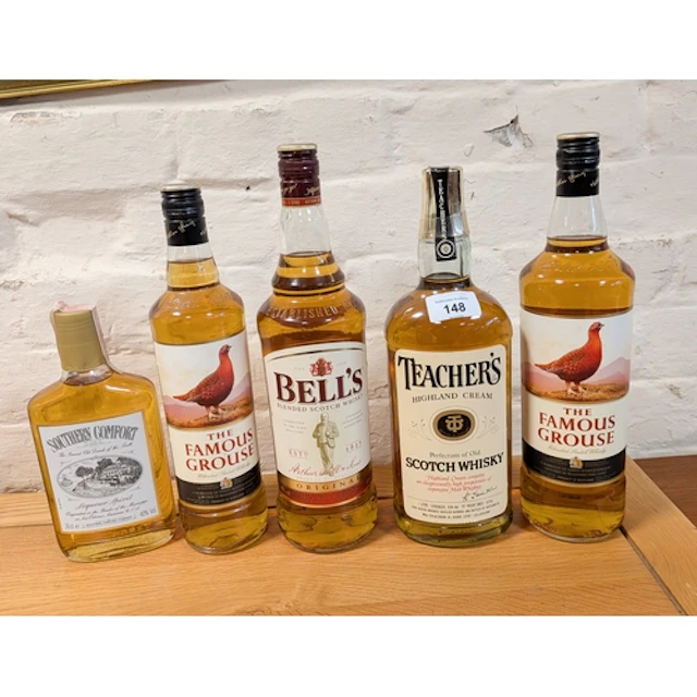 Five bottles of assorted whisky