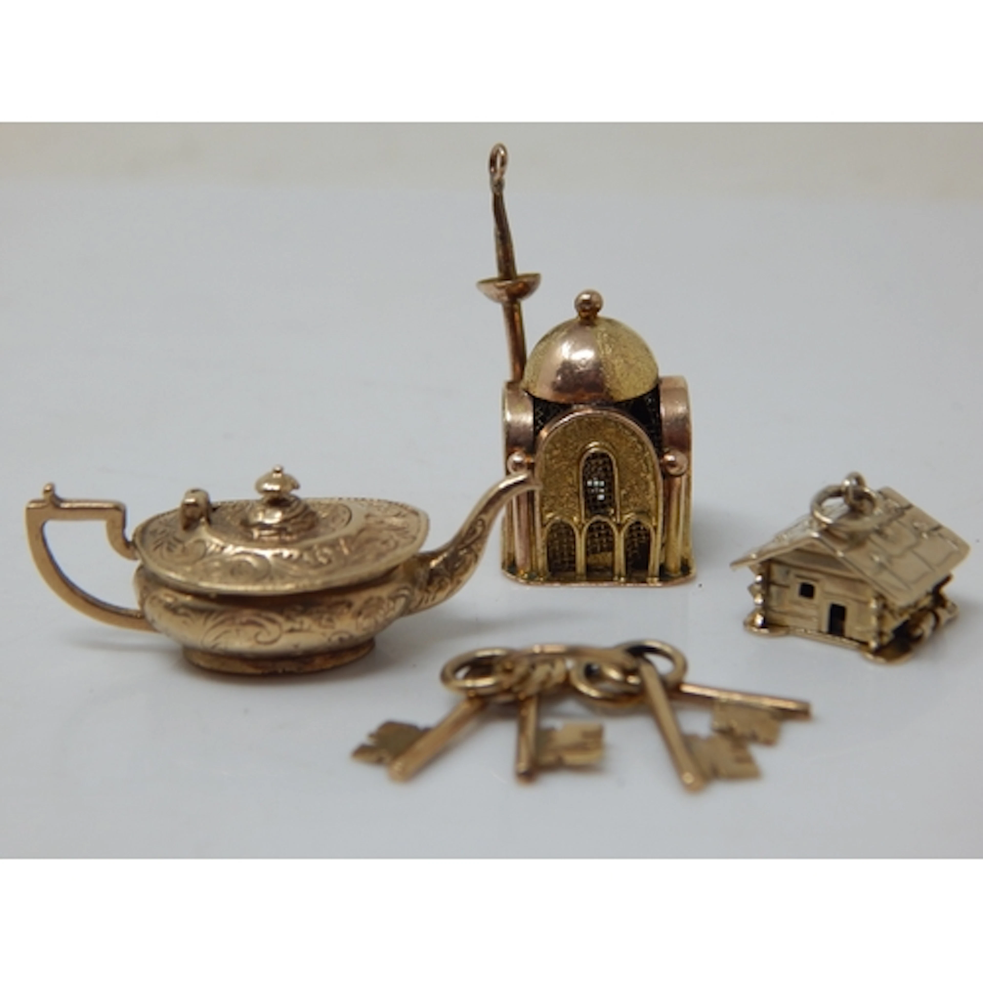 A Quantity of 9ct Gold Charms Formed as a Bunch of Keys, Art...