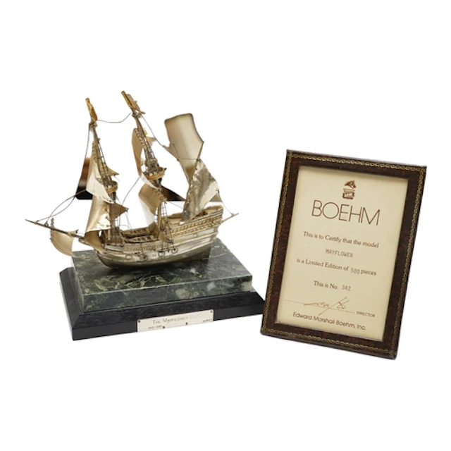 An Elizabeth II miniature silver model of The Mayflower ship...