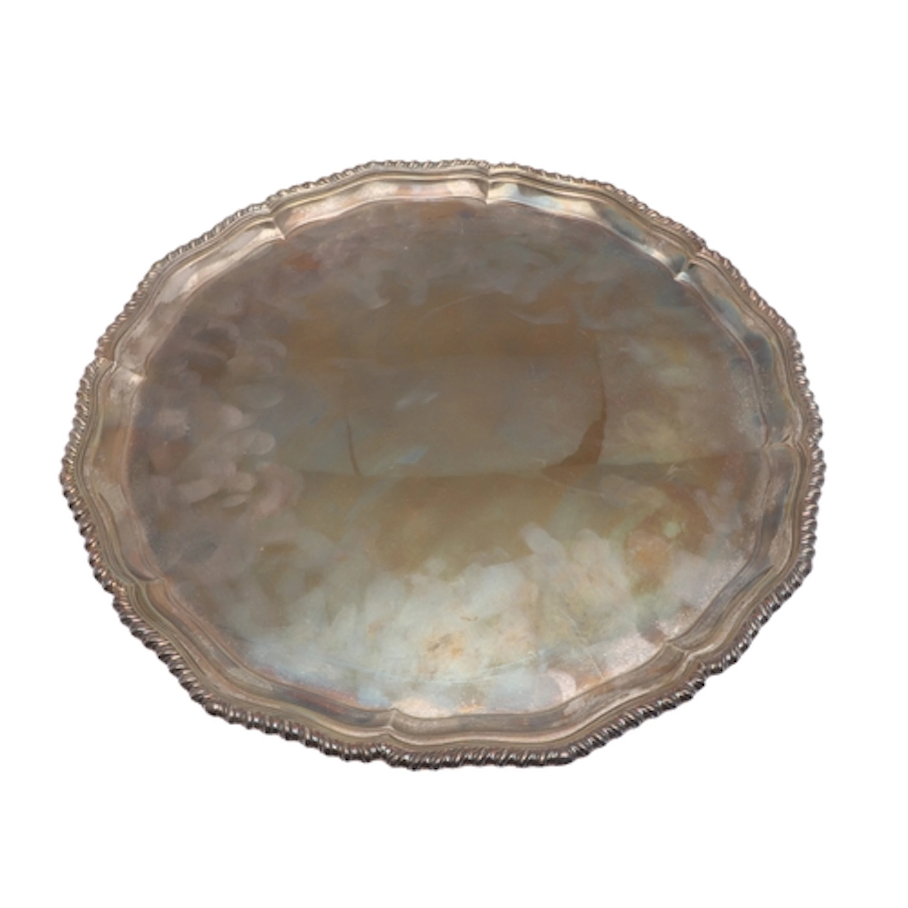 A SILVER SALVER. Of shaped circular form with gadrooned rim,...