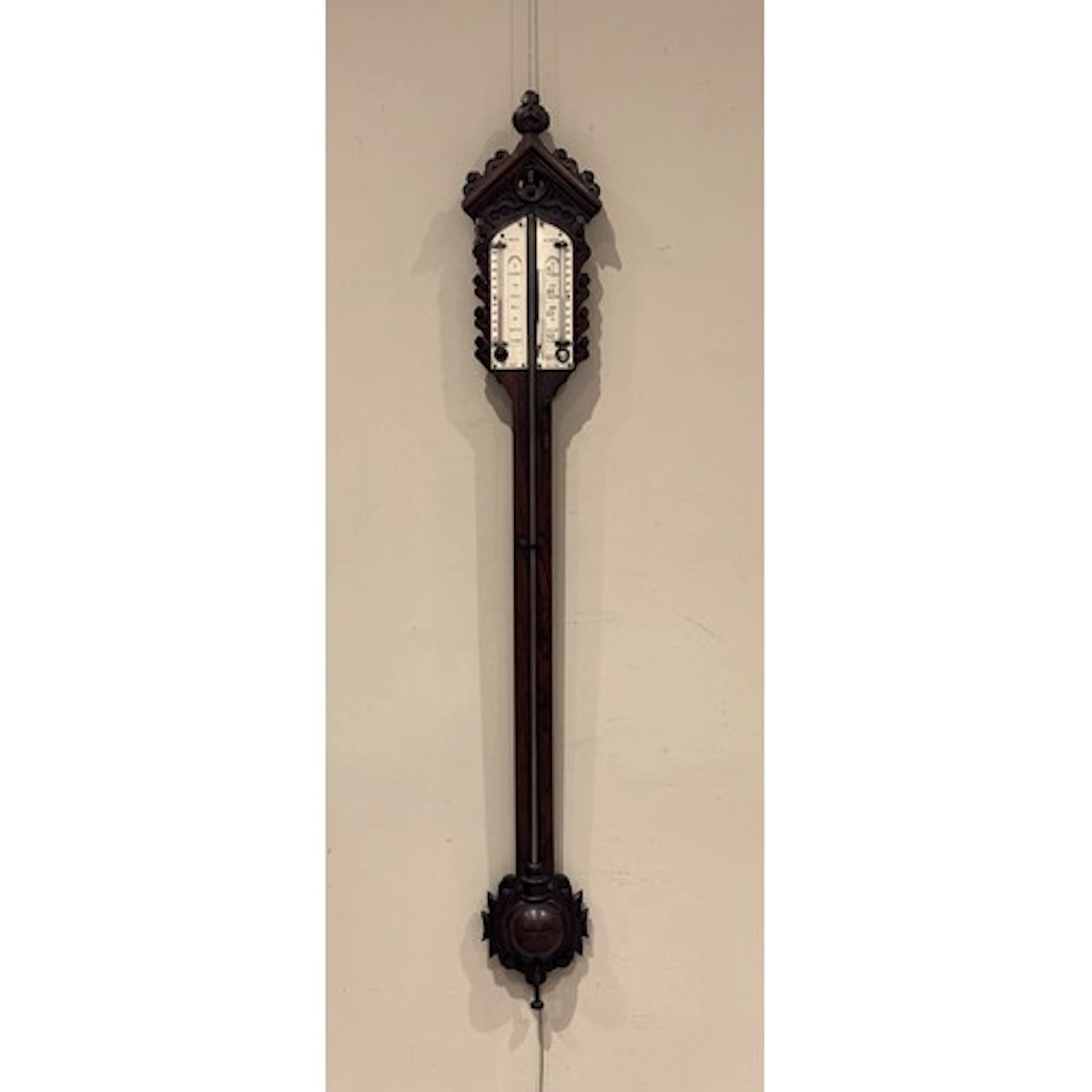 A stick barometer by J & A Kelley of Glasgow, late 19th cent...