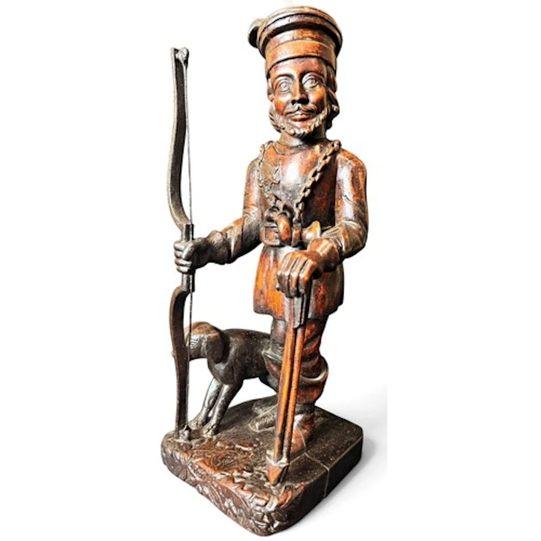 A substantial folk art carved wood figure representing Robin...