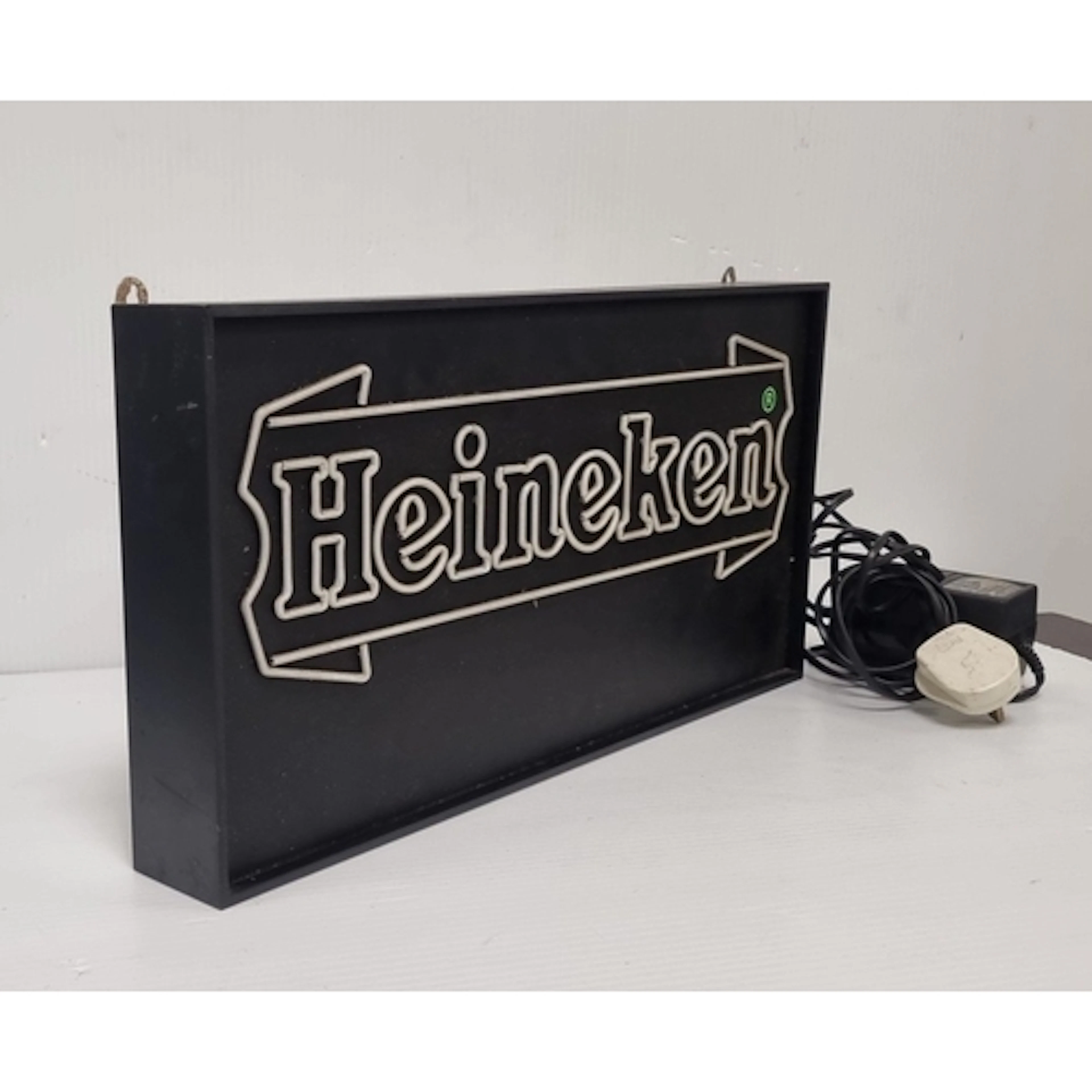Heineken illuminated bar sign, H: 25cm x W: 50cm x D: 6cm