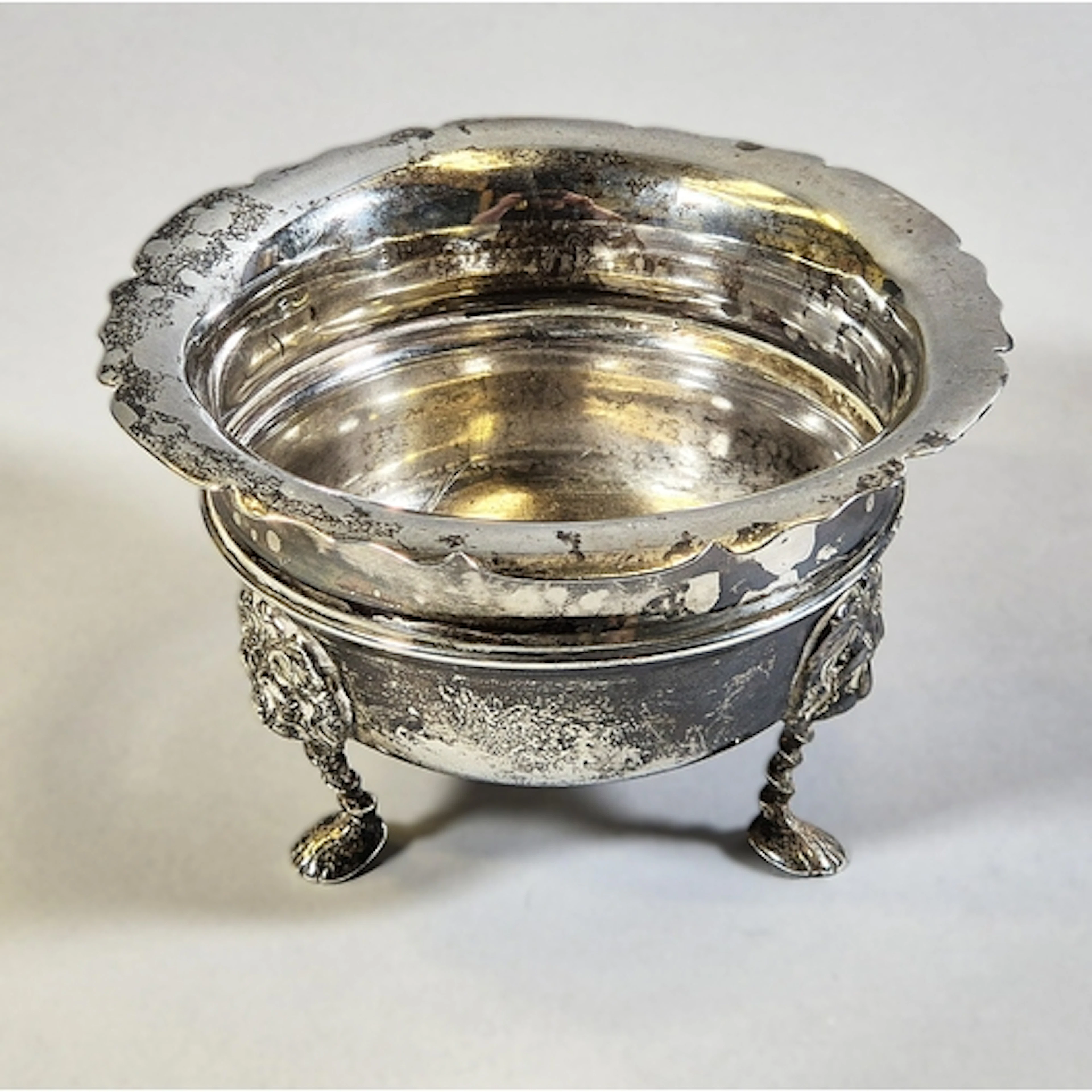 Edward VII silver sugar bowl with wavy rim on lion mask foot...