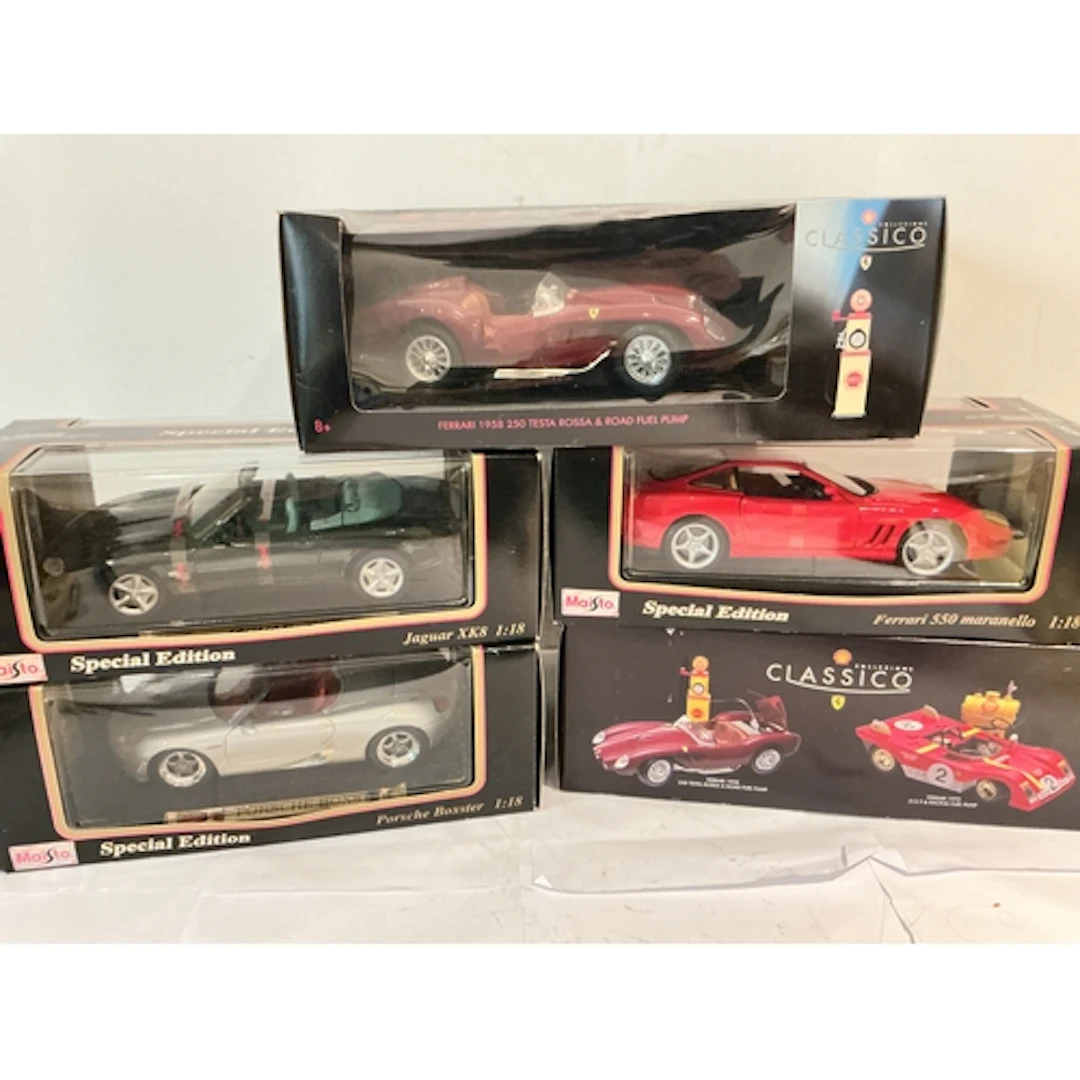 A Collection Of Boxed 1/18 Scale Diecast Cars. including Mai...