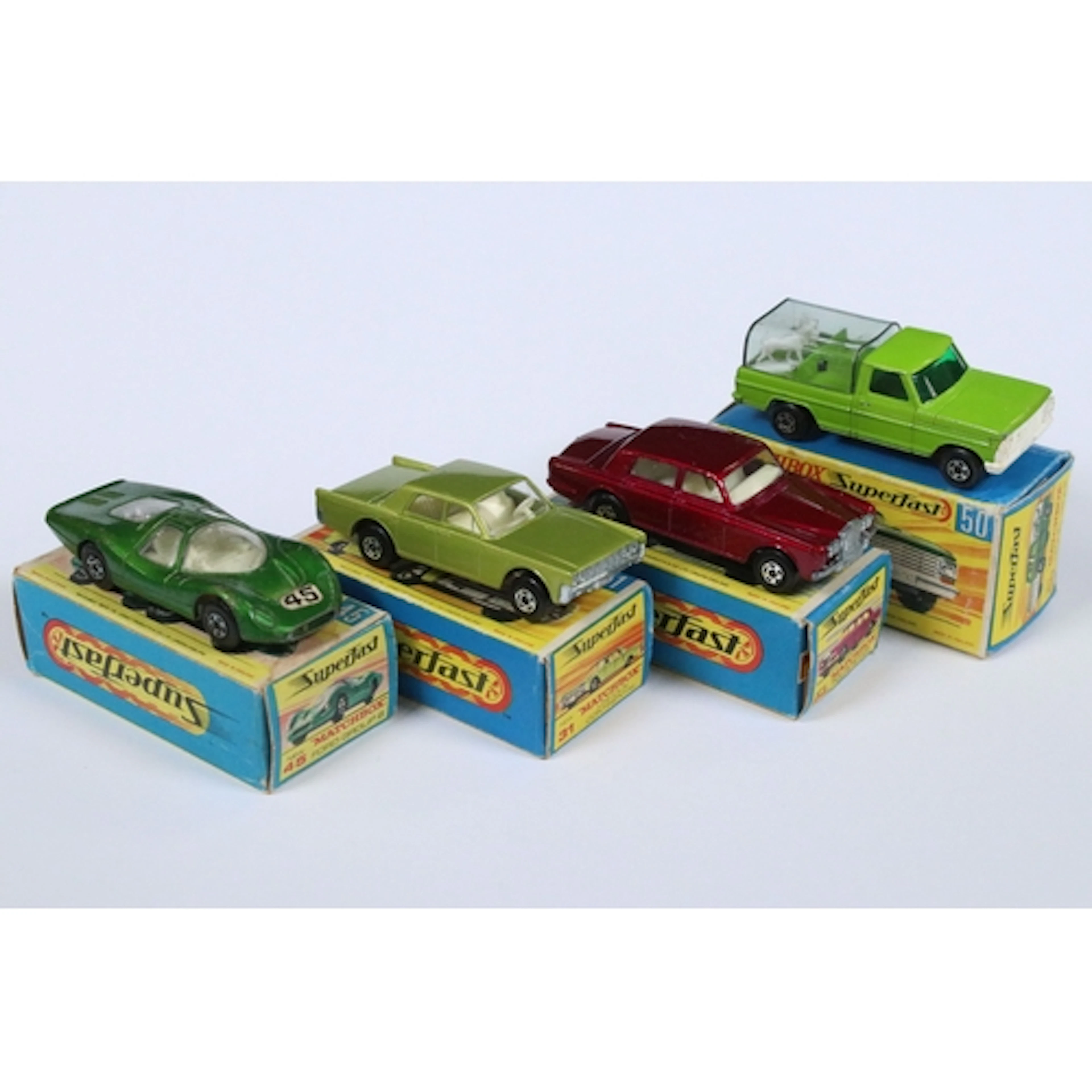 Four boxed Matchbox Superfast diecast models to include 24 R...