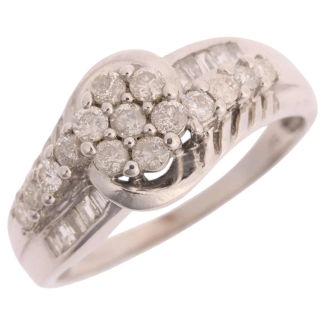 A 9ct white gold diamond cluster ring, TJC, claw set with mo...