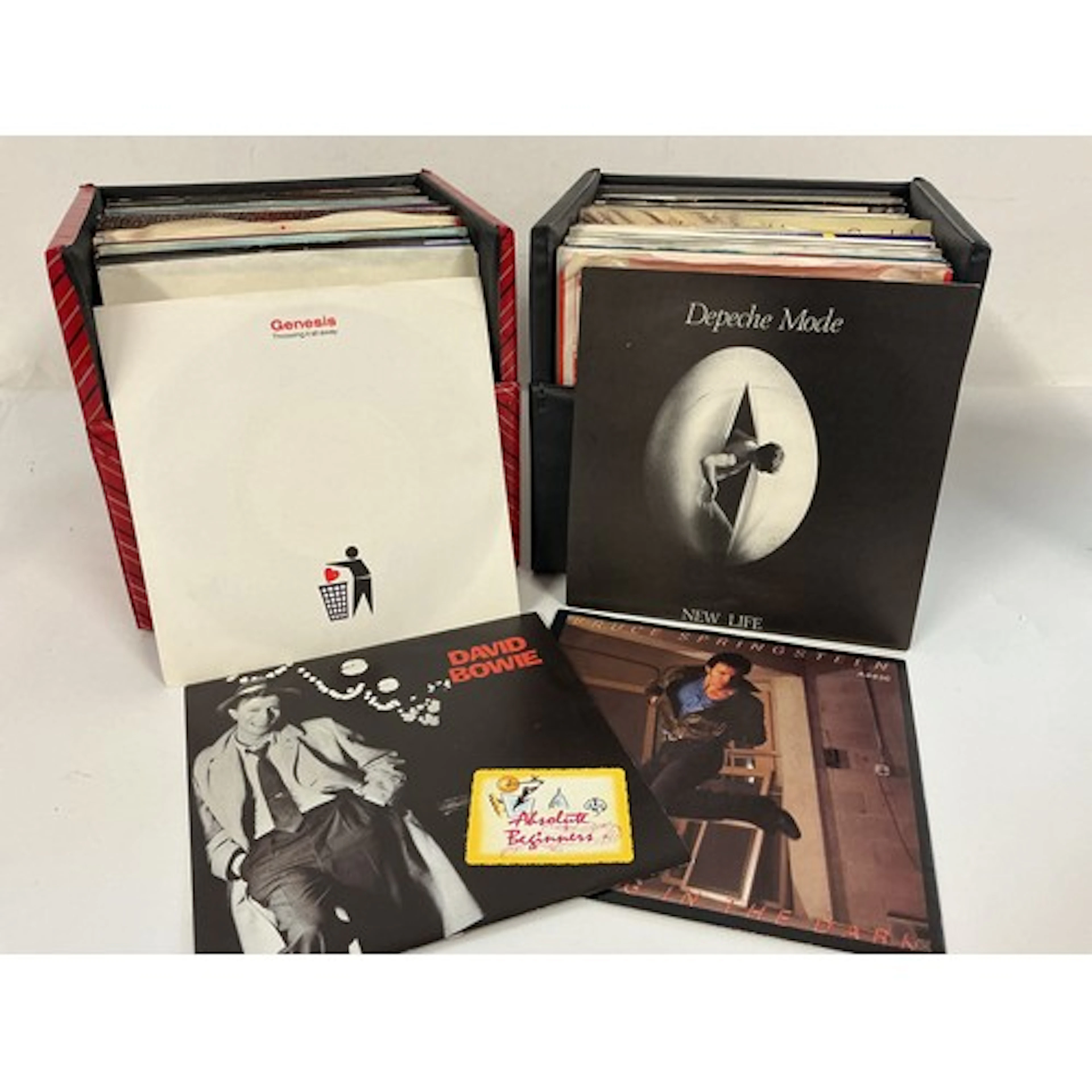Four record cases of 7” singles and EPS by various artists i...