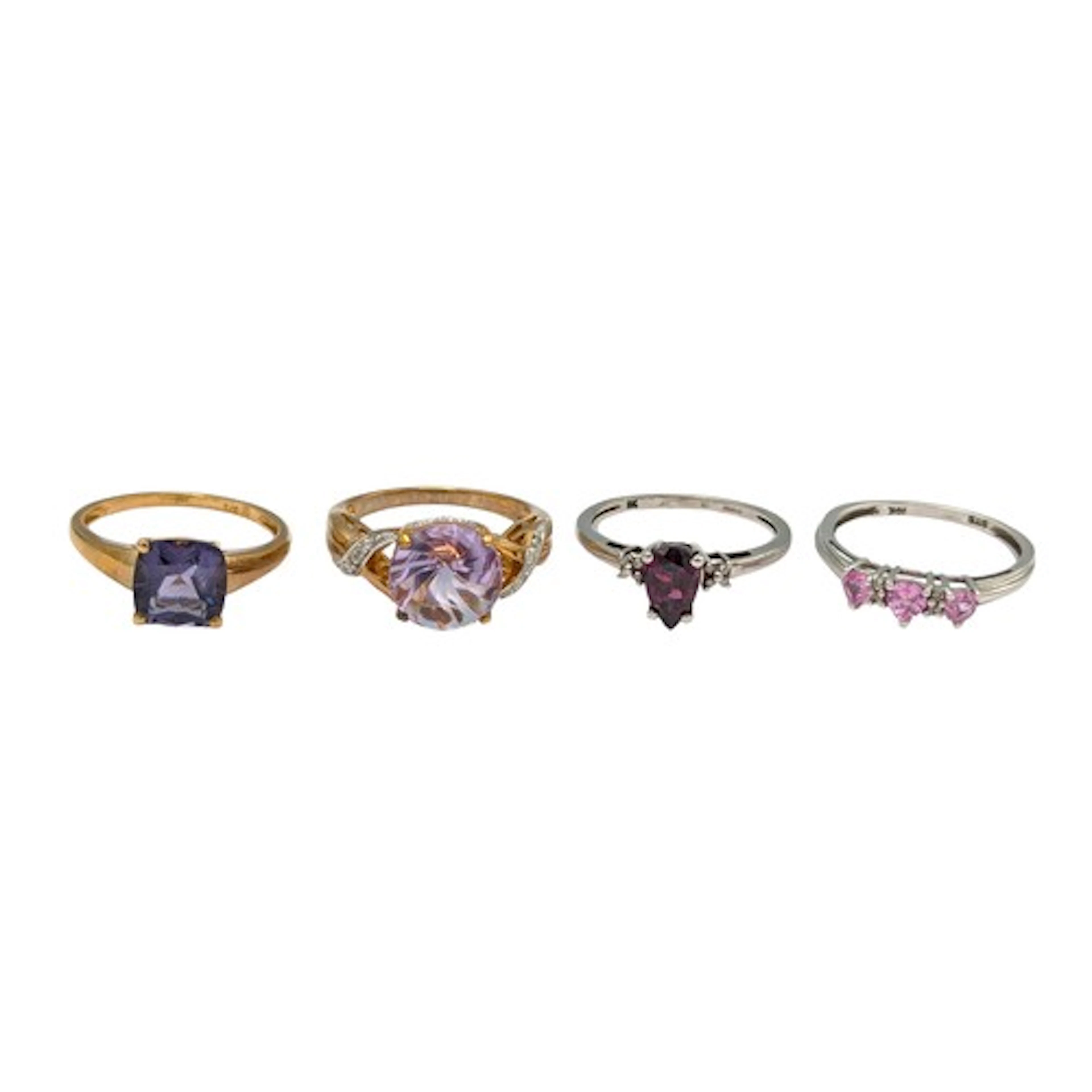 A 9ct white gold amethyst and white stone ring, size O, anot...