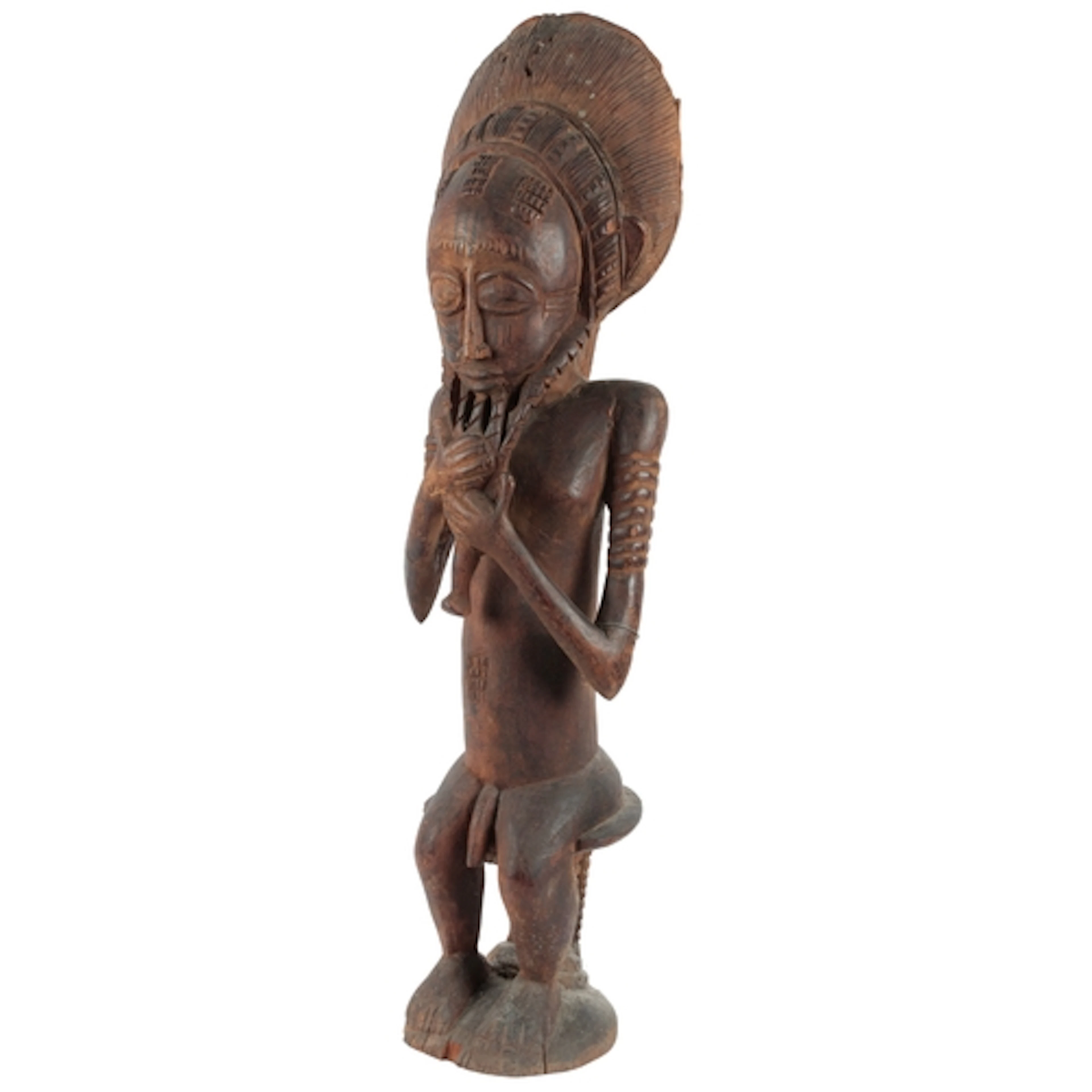 A large Baule wood seated figure, 'Asie usu', Ivory Coast, t...
