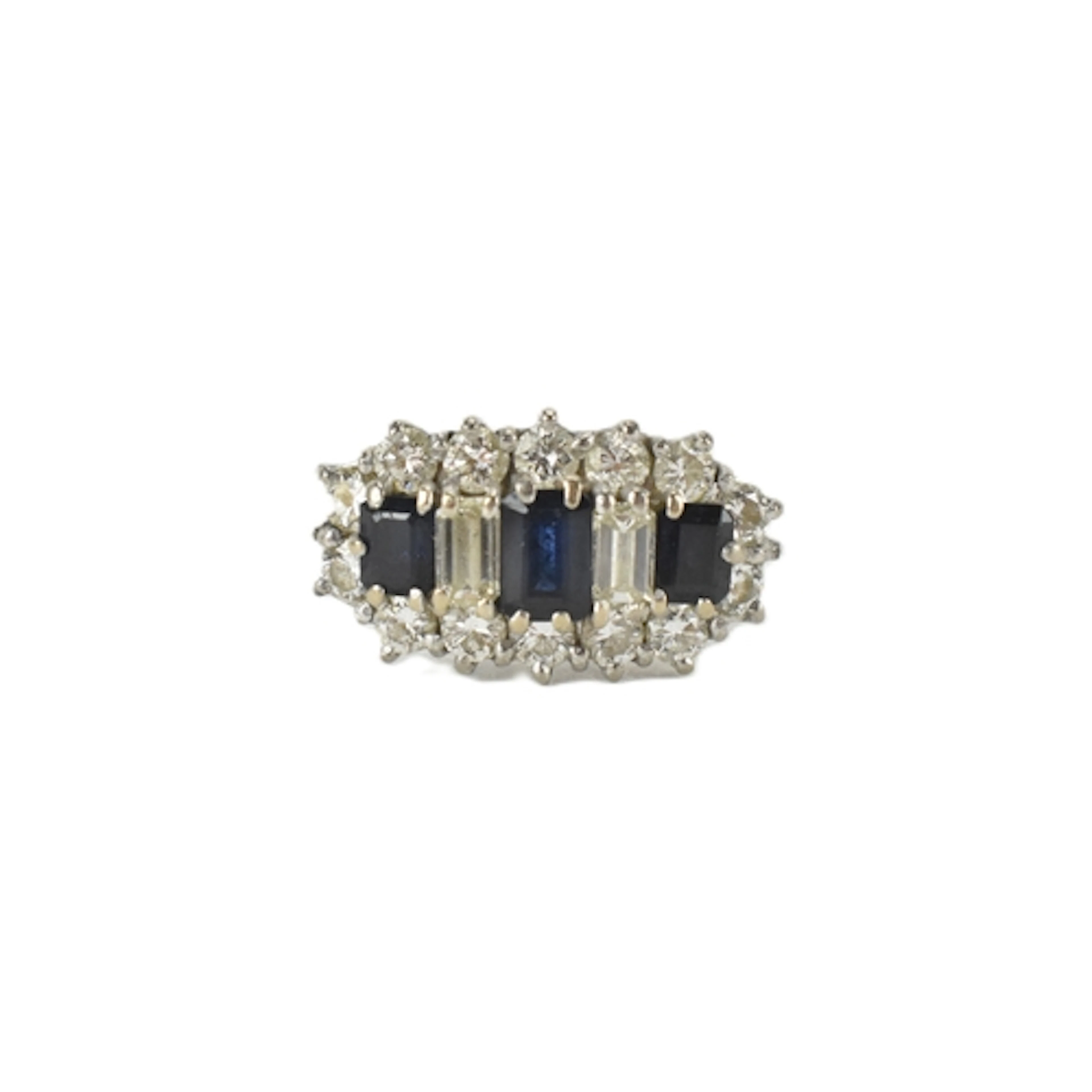A sapphire and diamond 18ct white gold ring, set with three ...