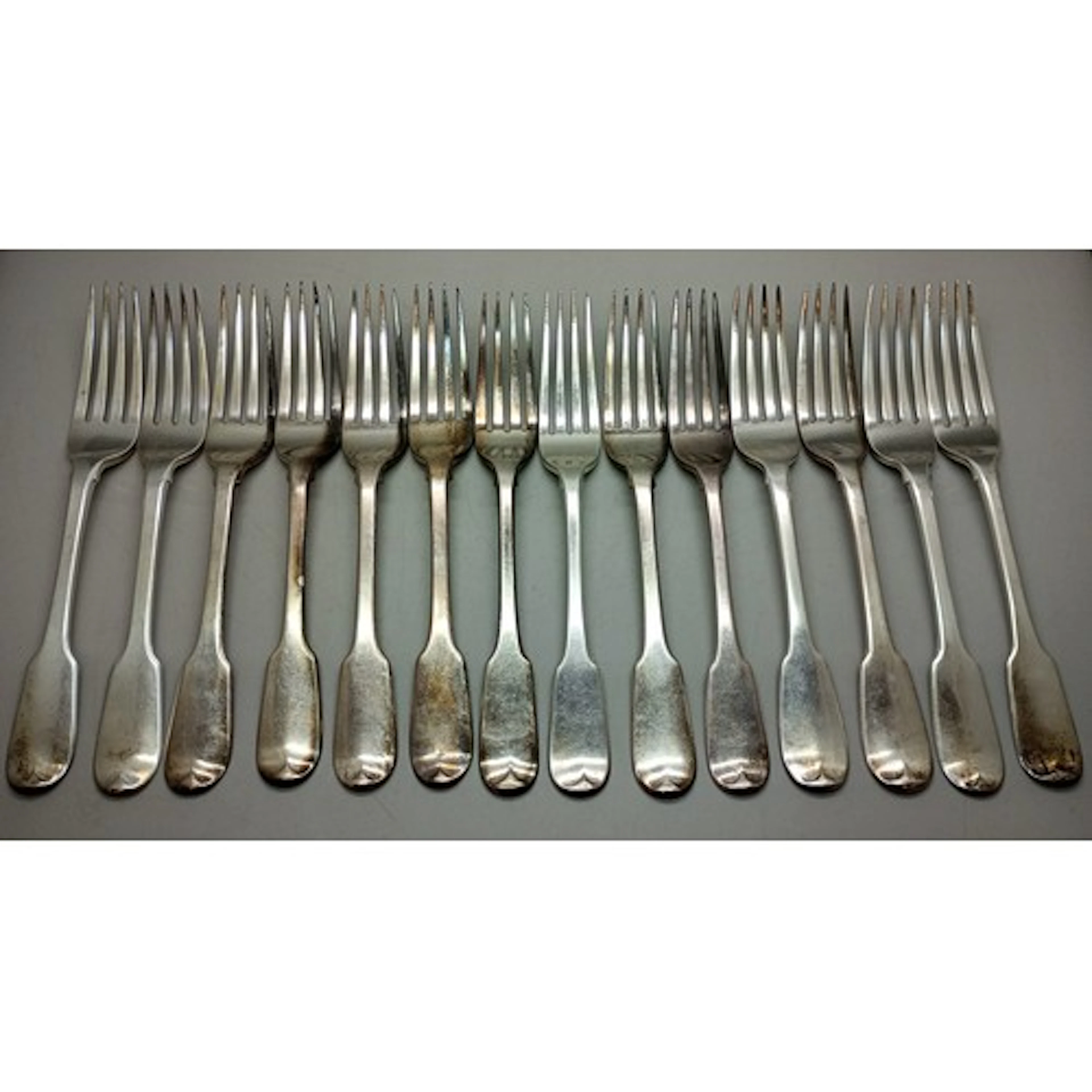 A George III silver fork set with monograms, London, various...