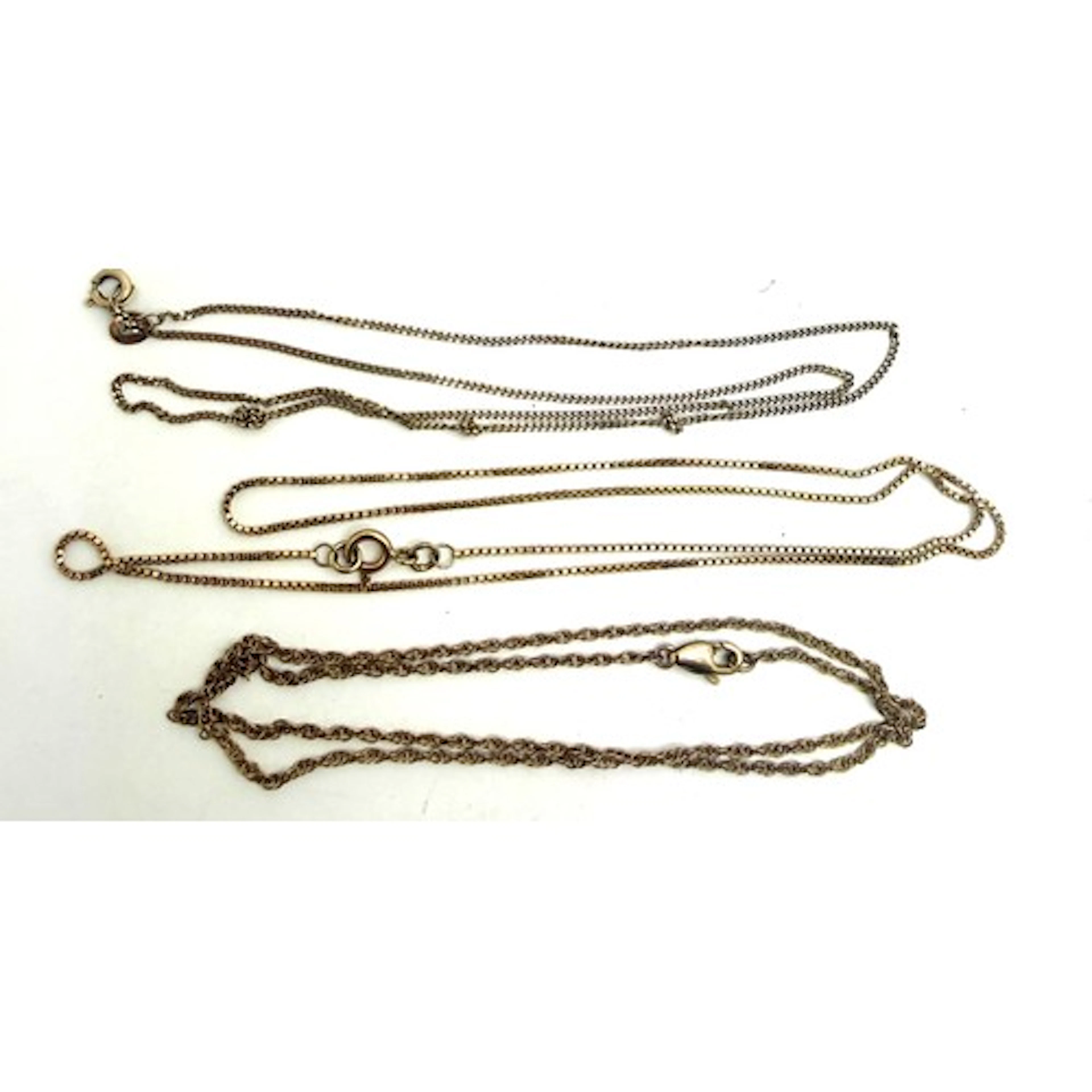 Three 9 carat gold chain necklaces. Length 46cm, 41cm, and 4...