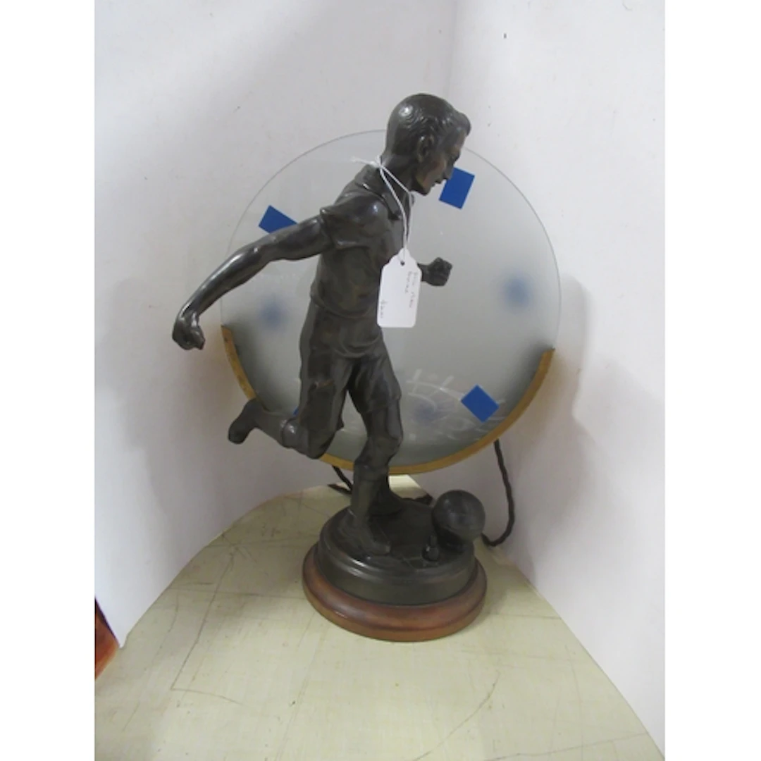 A table lamp, with frosted glass discs and mounted with a br...